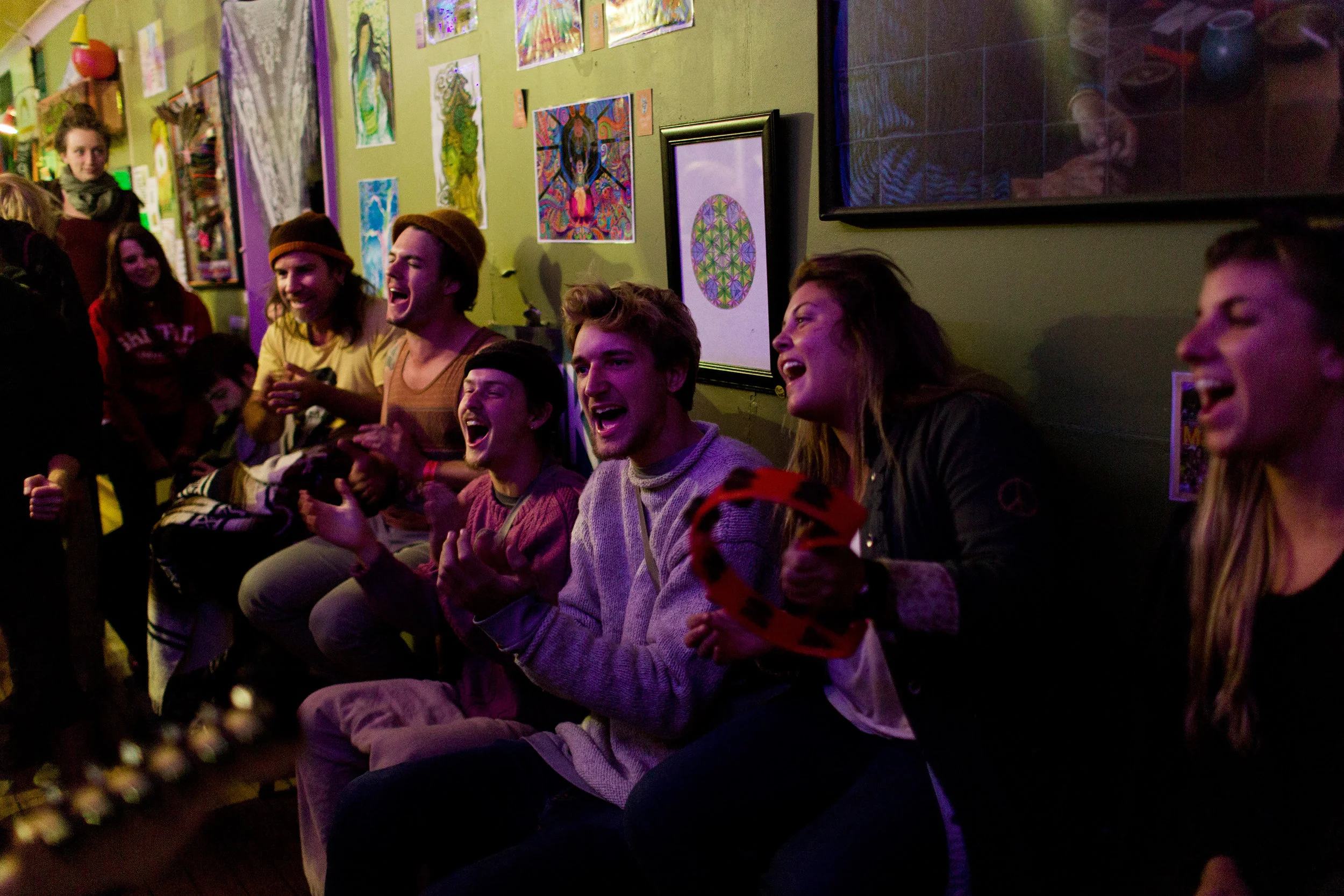  Revellers sing along to live music in the Hemp Bar, Nimbin NSW, Australia. Smokers find refuge in several cafes and bars along Cullen Street. 