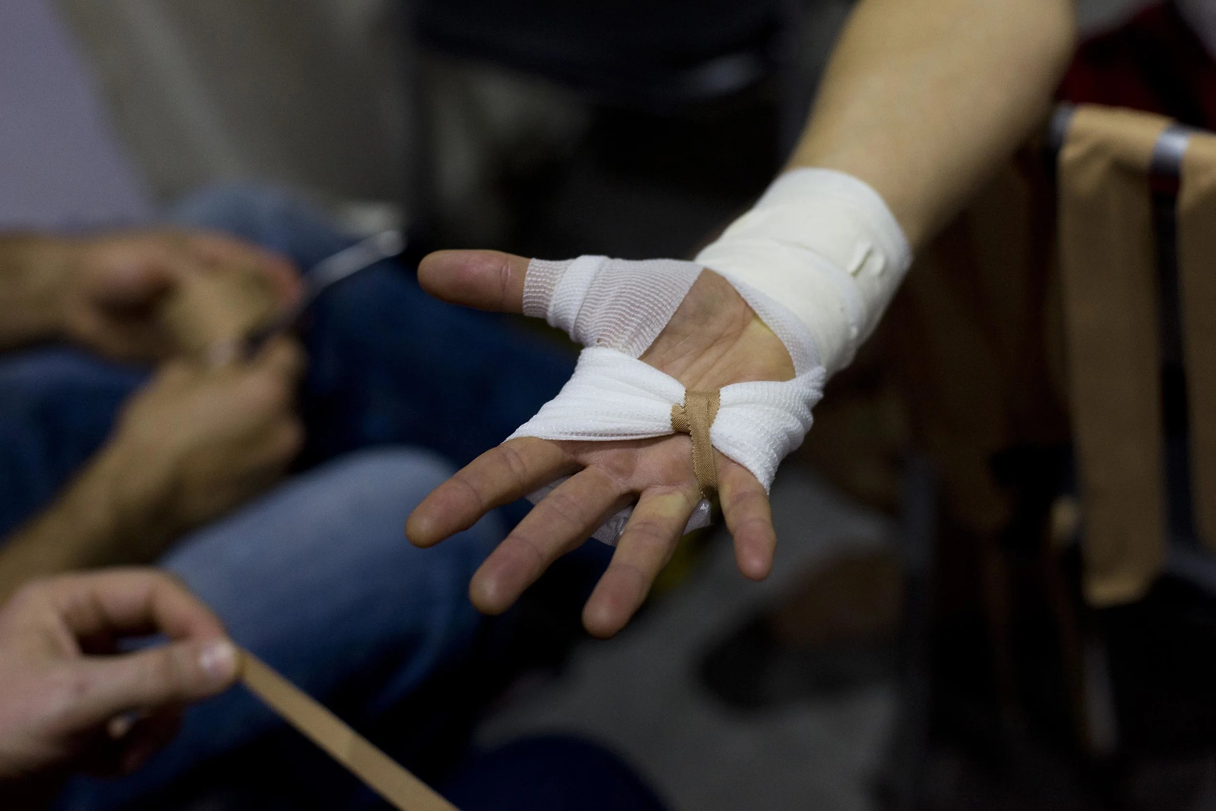 A fighter's hands are prepared backstage, Australian Fighting Championship at Melbourne Pavilion, Victoria. 