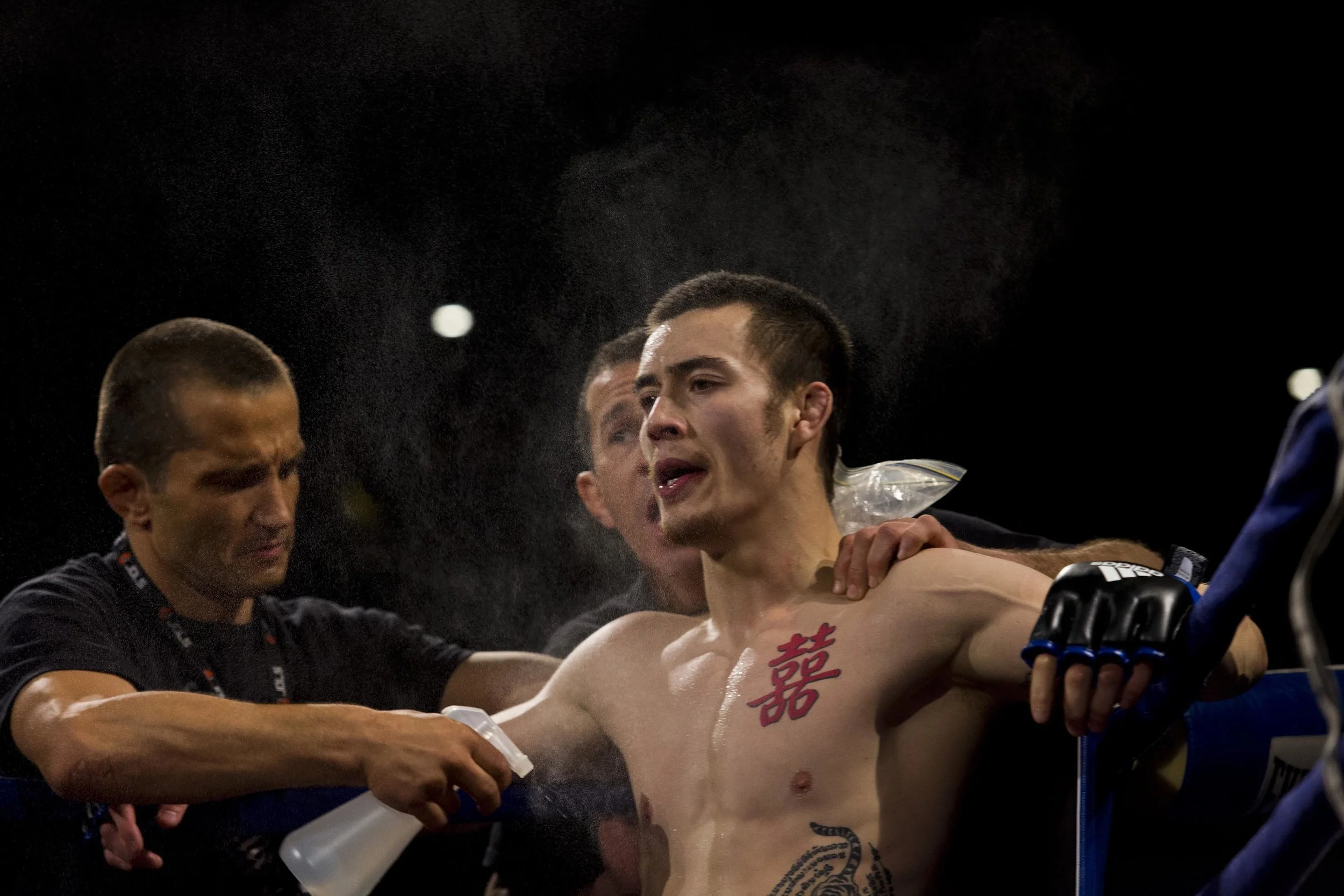  Regan Neoh takes a break in between rounds at the Australian Fighting Championship, Melbourne Pavilion, Victoria. 