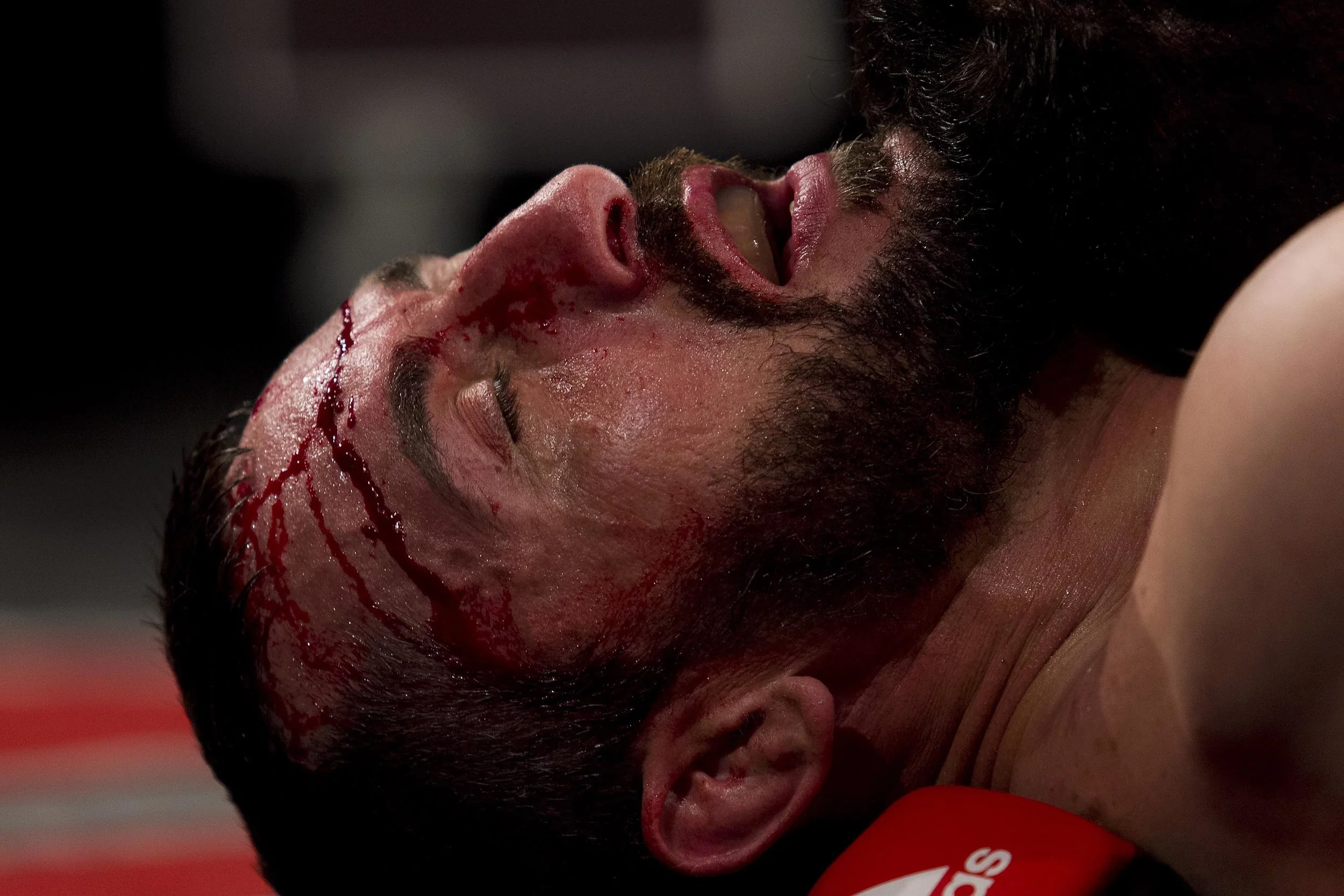  Viktor Grujic struggles after being dealt a blow by Zein Saliba at the Australian Fighting Championship, Melbourne Pavilion, Victoria. 