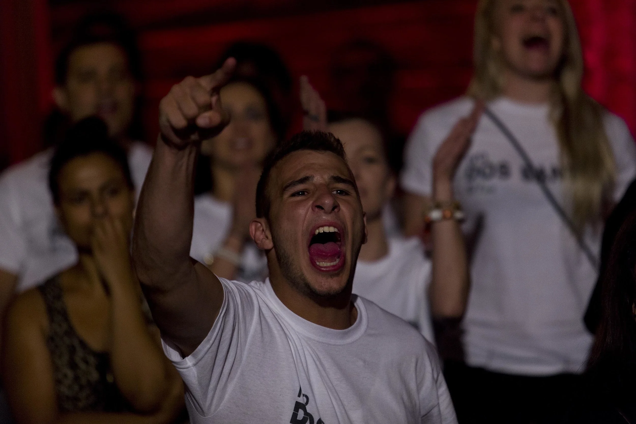 Members of the crowd express their excitement at the Australian Fighting Championship, Melbourne Pavilion, Victoria. 