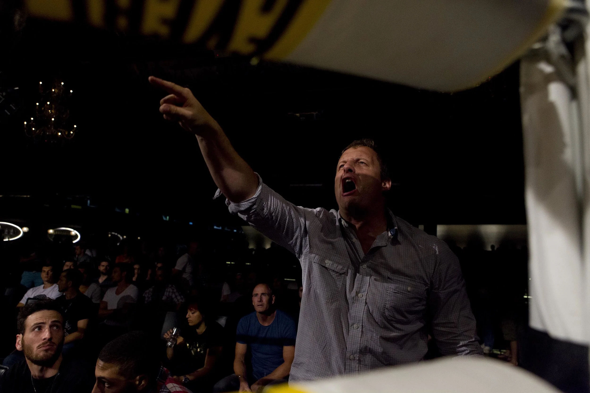  Emotions run high between the crowd and team members at the Australian Fighting Championship, Melbourne Pavilion, Victoria. 