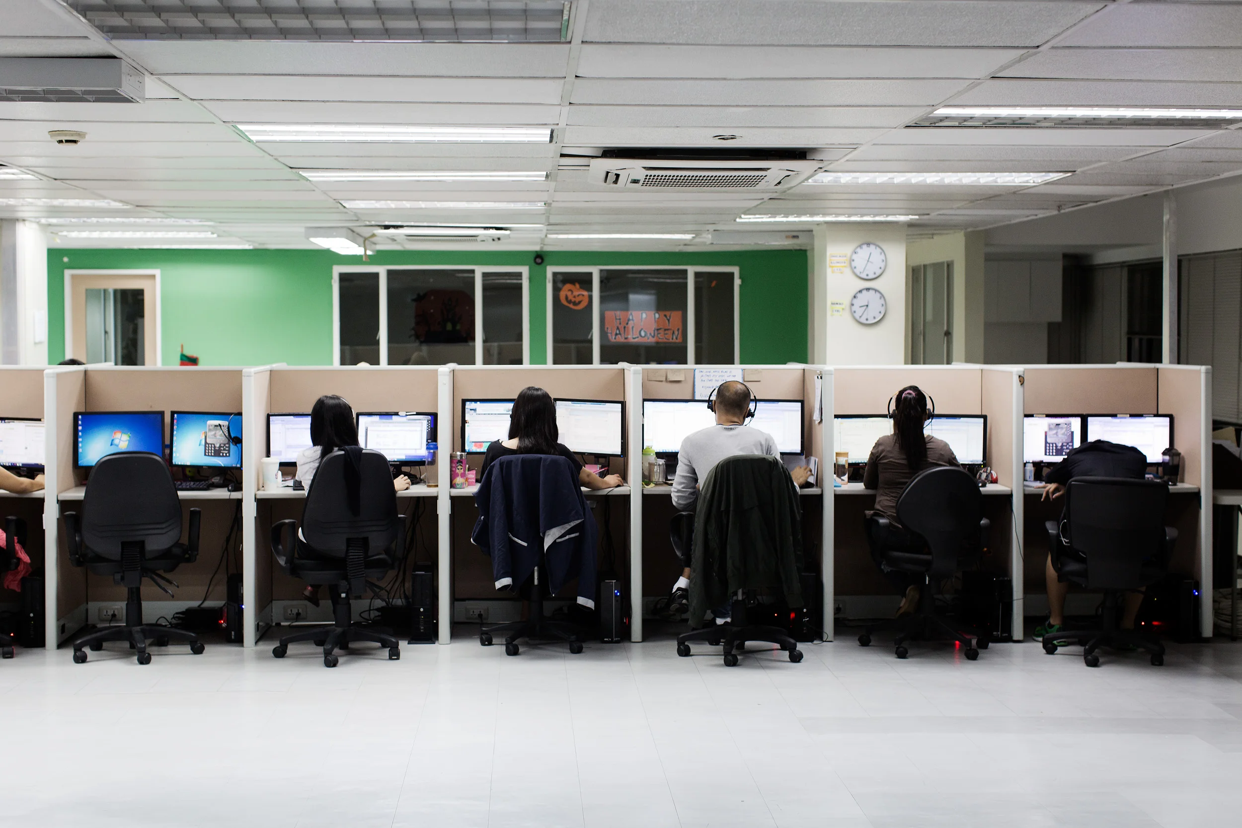  Call centre workers of Pinoy Partners Outsourcing Centre in Makati City, Philippines, work late into the night and early into the morning for American clients. 
