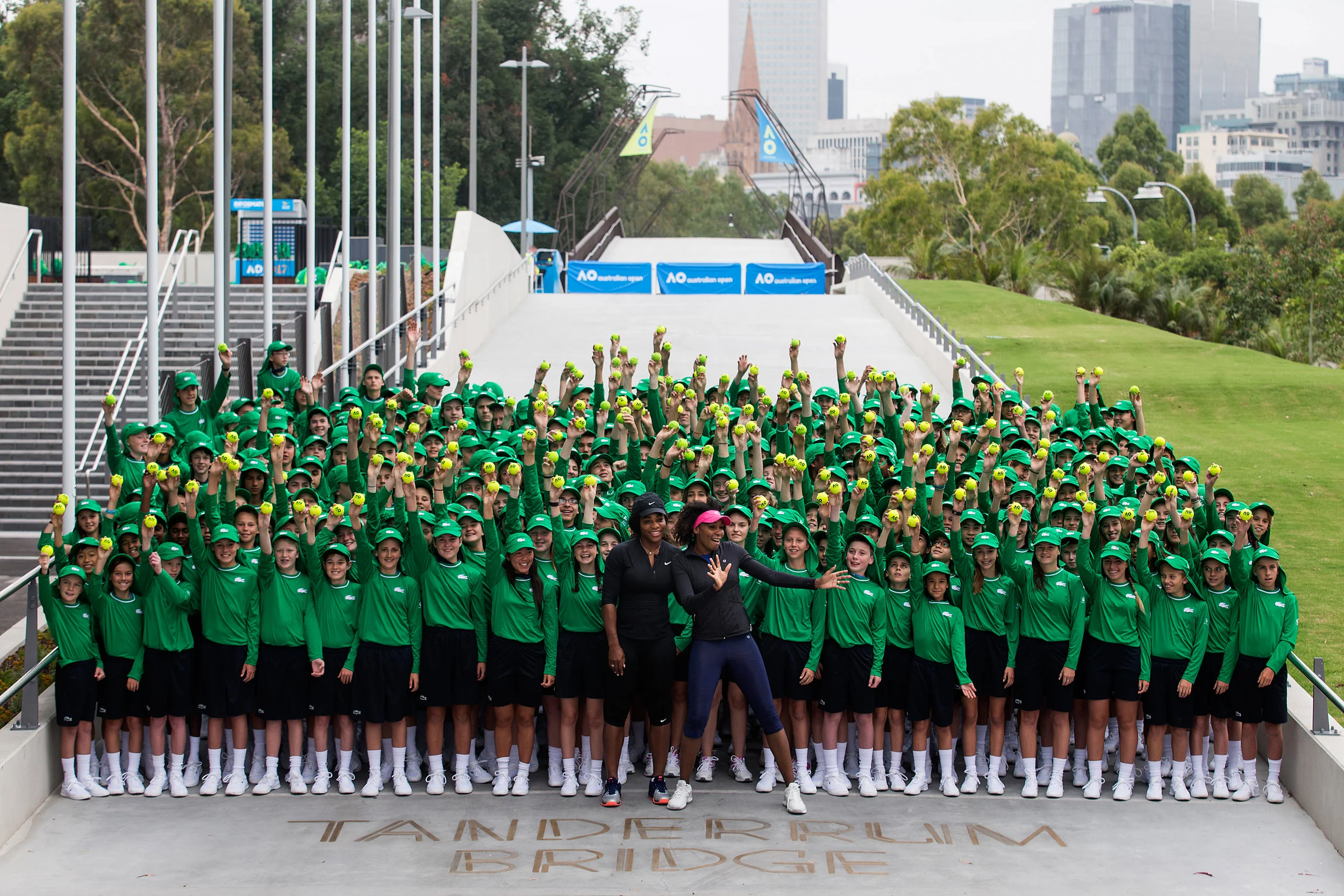  U.S. tennis stars Venus and Serena Williams at Melbourne Park with the Australian Open ball kids. 