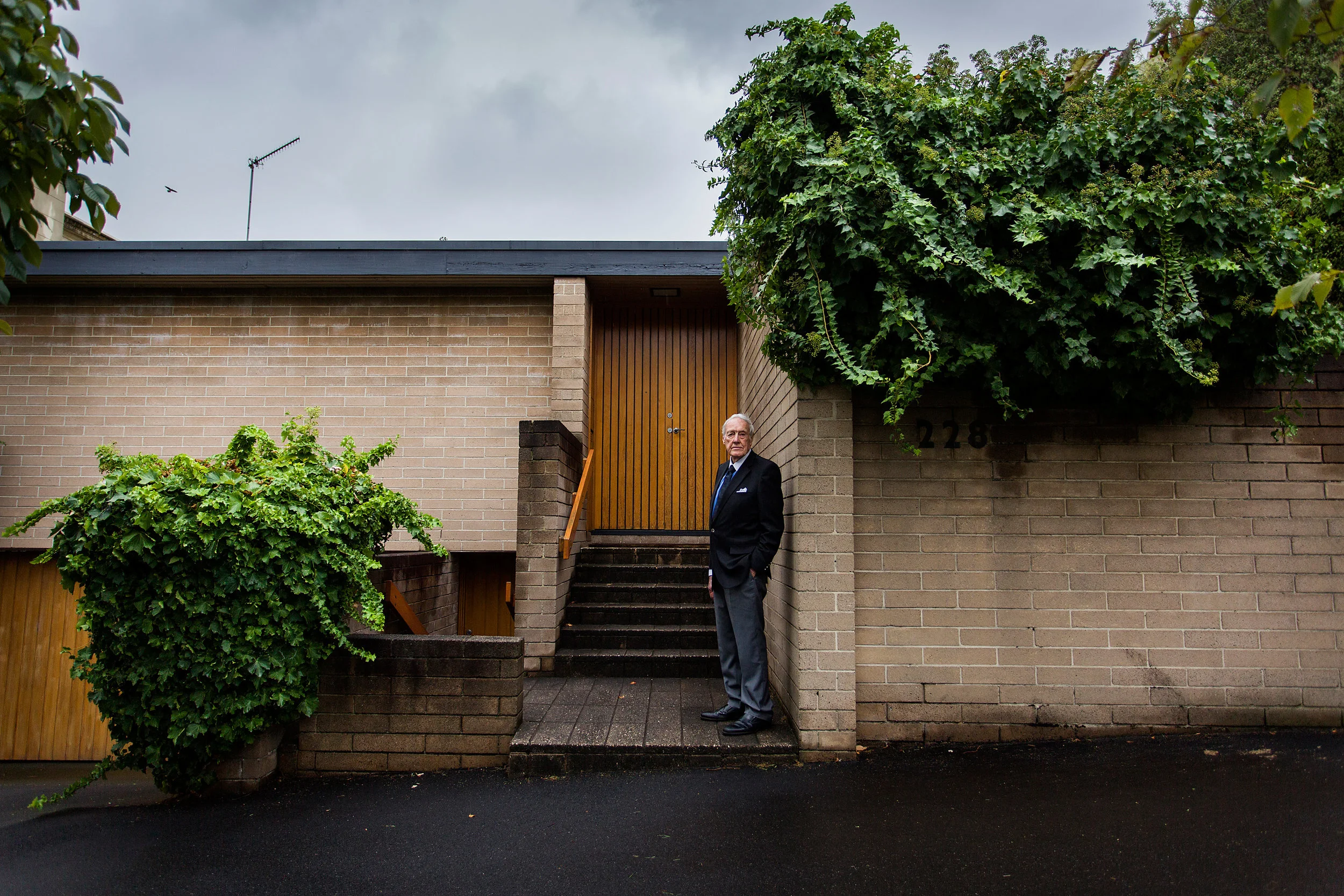  93-year-old architect Neil Cherehan at a property he designed in South Yarra that is being considered for heritage listing. Photograph for The Age. 