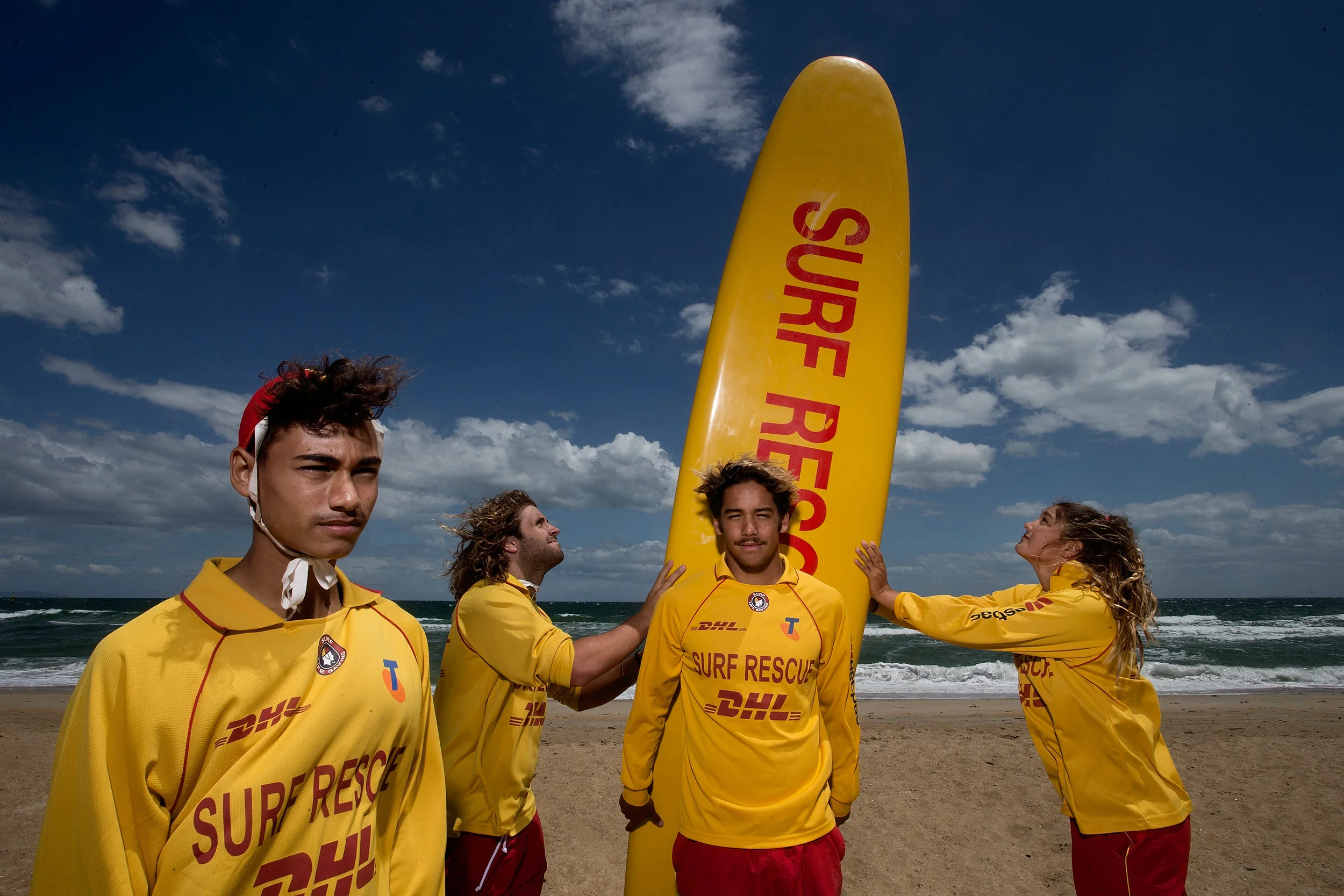  Callan Beaton, Chris Petropoulos, Tyler Annan-Coe and Brooke Annan-Coe on the beach at the Mordialloc Life Saving Club. Photograph for The Sunday Age. 