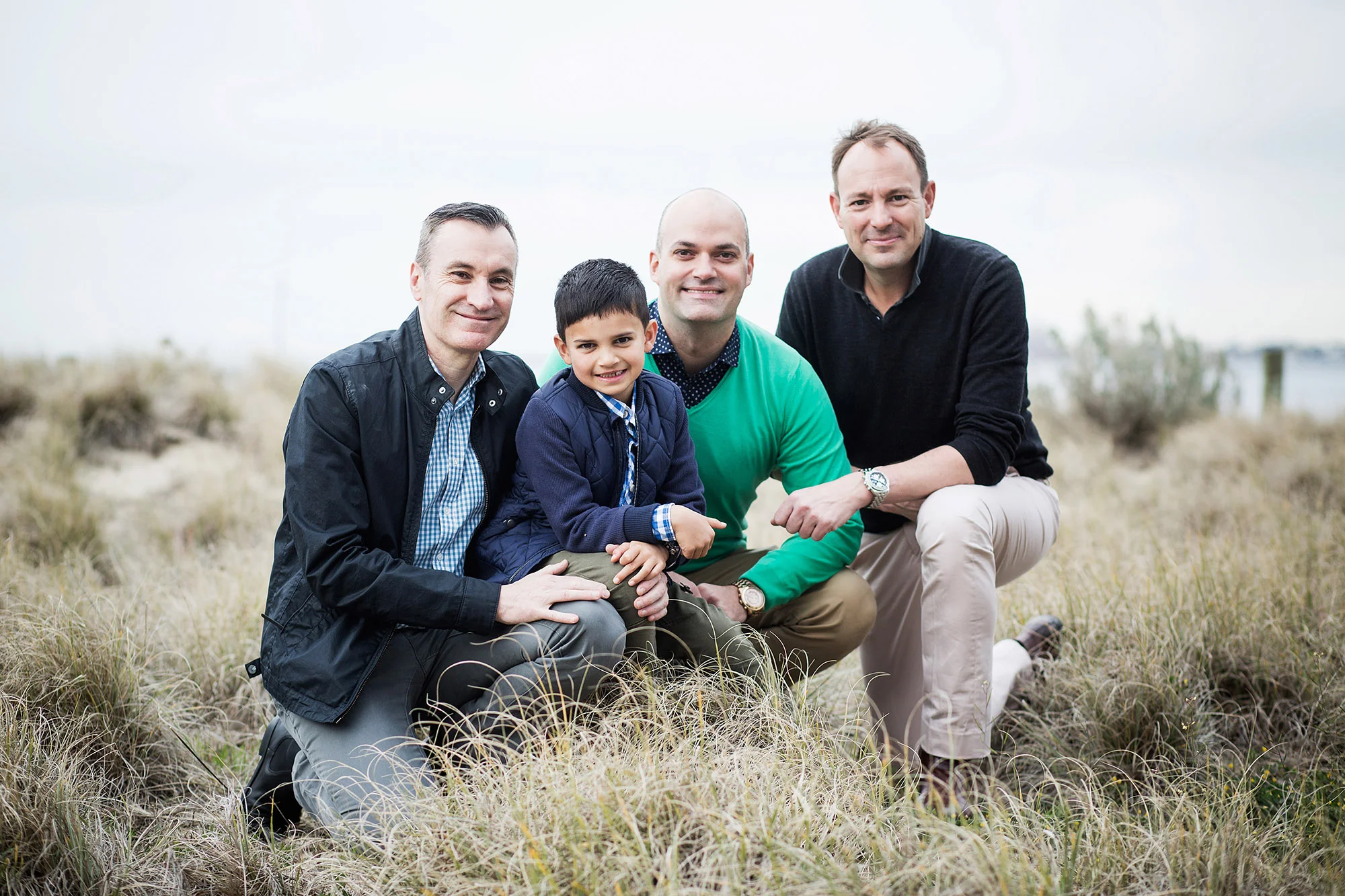 Jason Schutze-Stafford with his 7-year-old son Max Schutze-Stafford, former Brendan Schutze-Stafford (L) and current partner Wayne Noorman (R). Father's Day story for The Sunday Age.