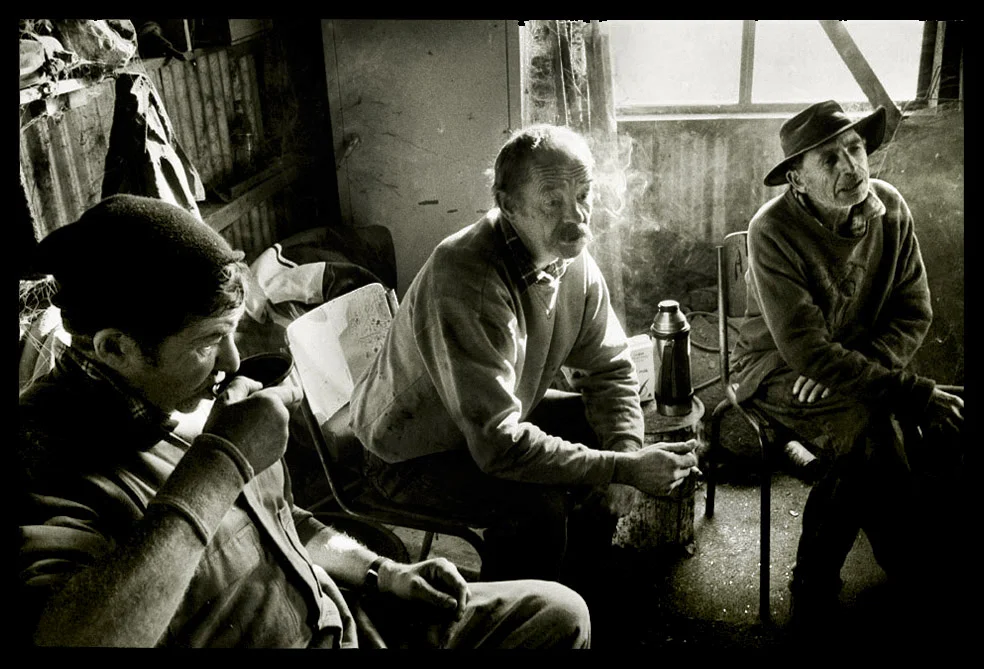 Graham, Al and Nick take their 15 minute smoko break at the Smith brother's Chaff Mill. Rocklyn, Victoria 2007