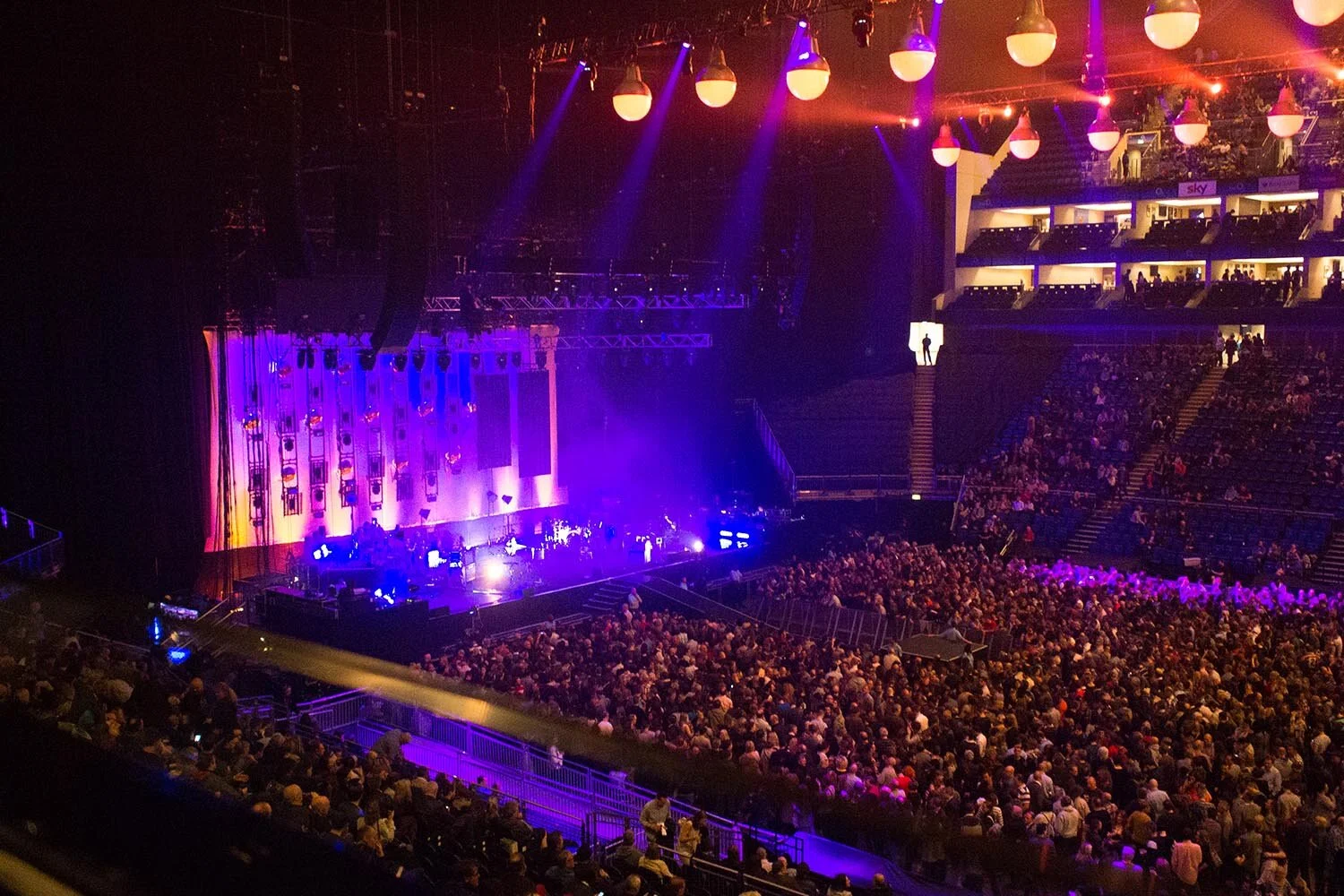 music venue o2 picture of stage with audience taken with phone