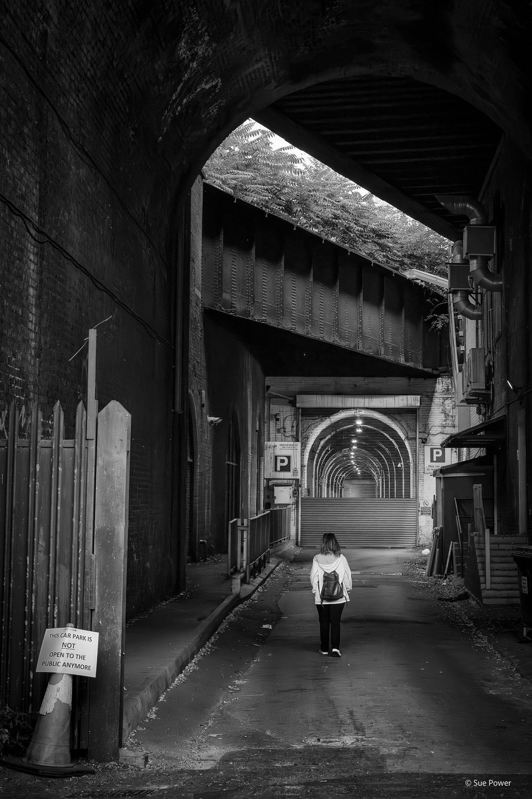 Is this what the future could look like❓
Member Sue Power has captured interesting geometry and even more poignant ideas in this shot of a girl walking under a bridge. 

Sue writes, &quot;I was just trying to understand the geometry and purpose of th