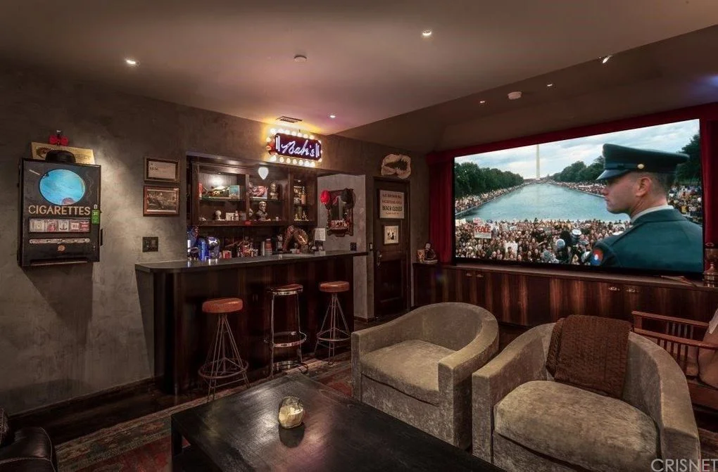 The bedroom also features a full cinema design and mini-bar.