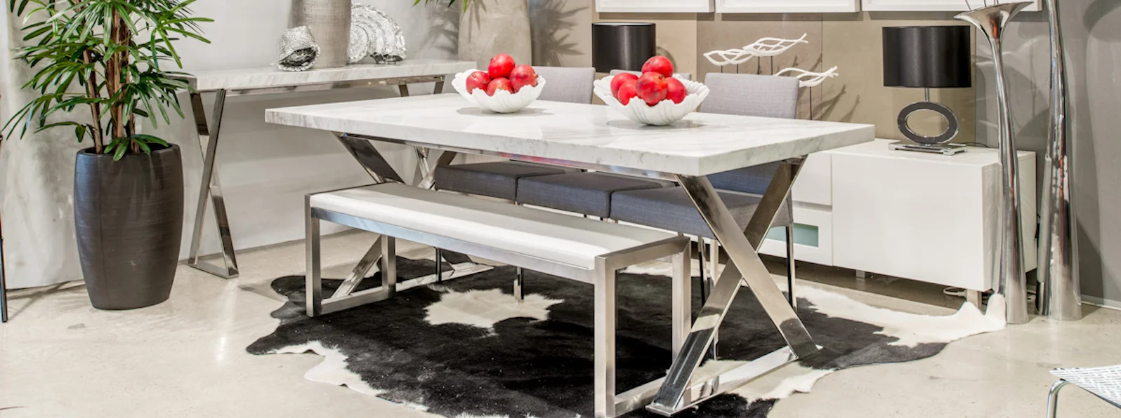 Lyn Ceaser Stone Dining Table from Moss Furniture.