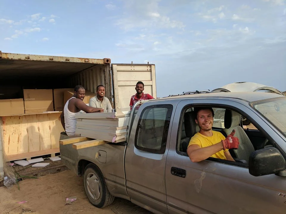 Any excuse to break out the pick up truck! Pile of panels in the back with team!