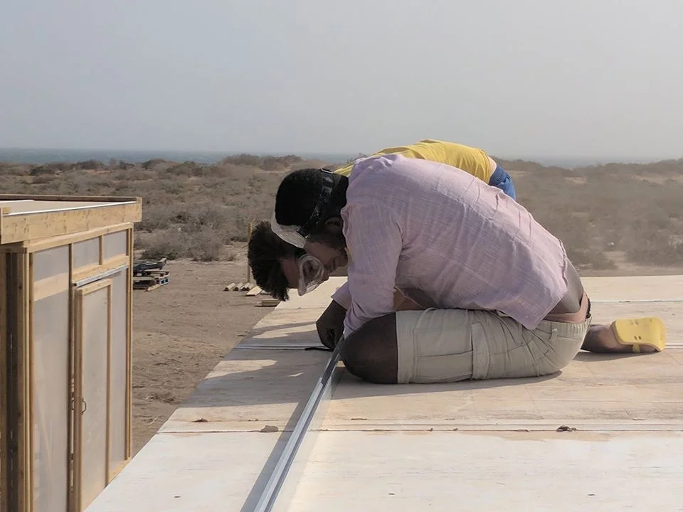 Karl and Abdihakiim concentrating hard through a dust storm! 