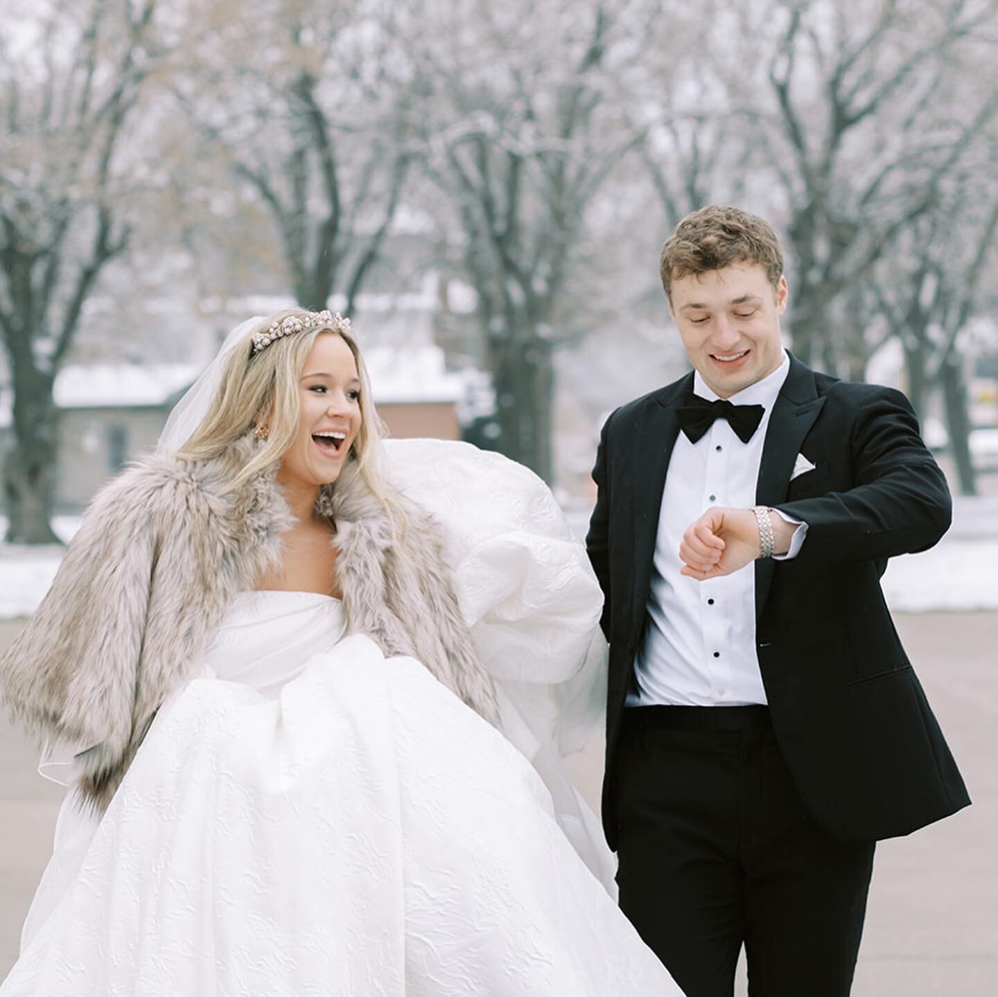 When it&rsquo;s wedding TIME 🤍⏱️ these two darlings bopping around town on their wintery midwest wedding day! 

Third slide: Which was colder? His cheeks, her hands? 😚🥹
.
.
.
Planning: @sarahwithcomposure 
Floral: @goodearthfloral 
Entertainment: 