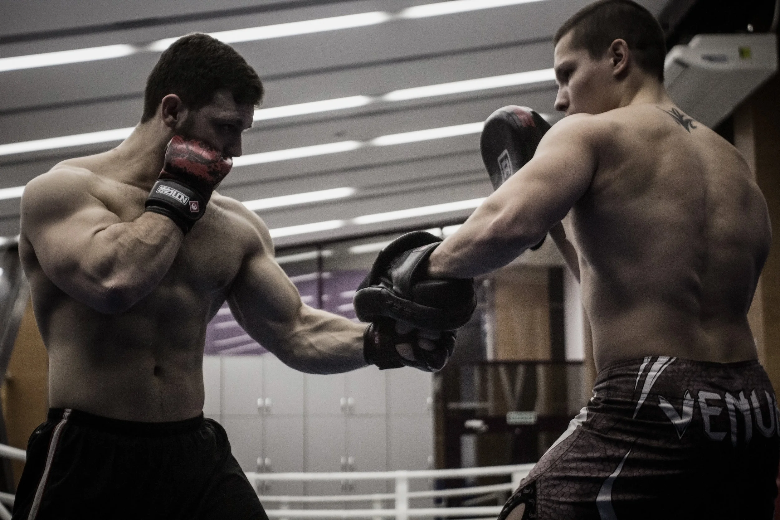 Extreme fighting and armwrestling with two muscle boys