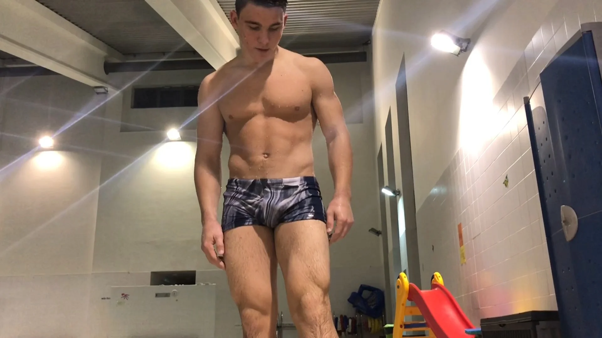 Young Muscle God Andrey and his awesome flexing show in waterpool