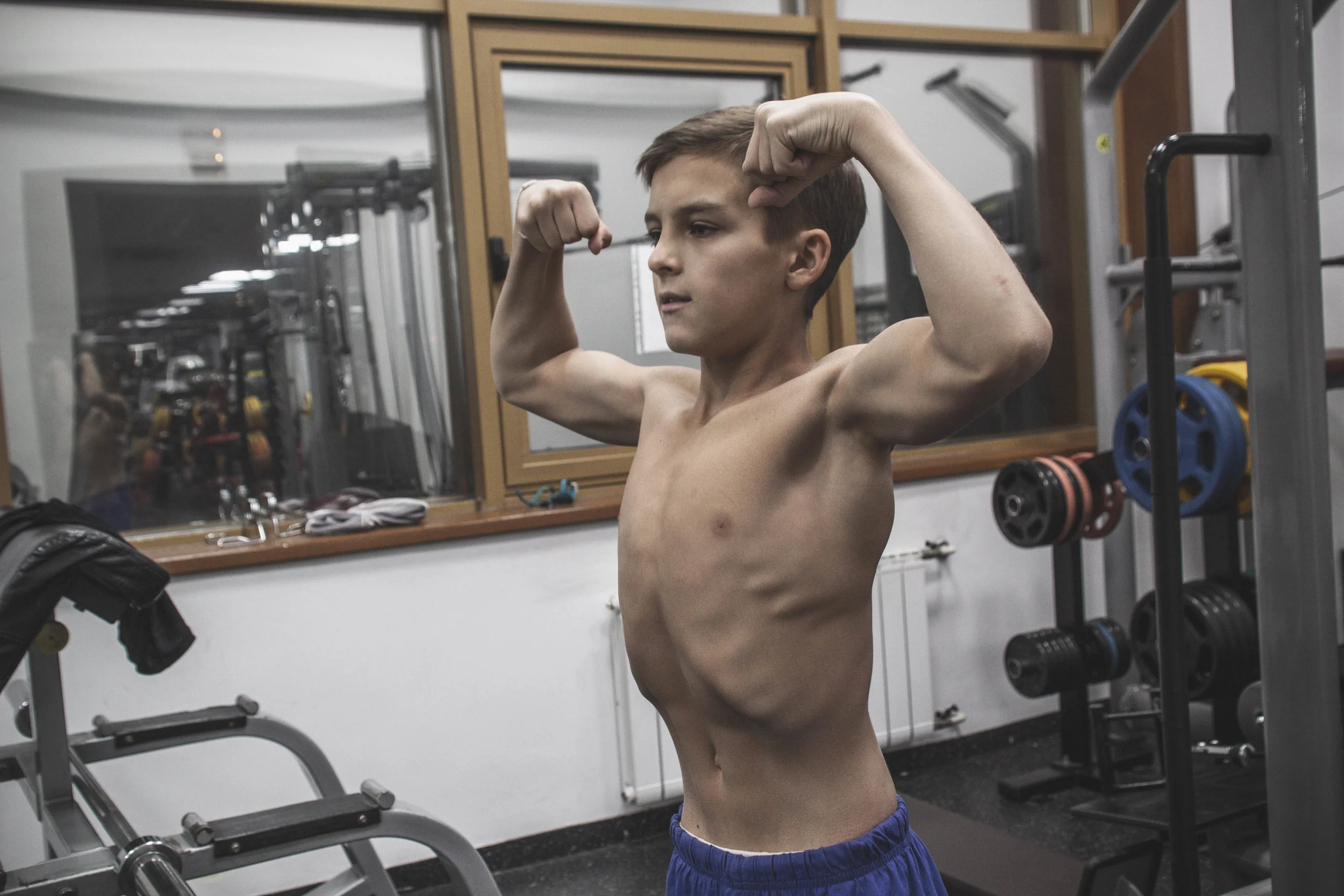 Youngest Bodybuilding champion Mark training and flexing in gym