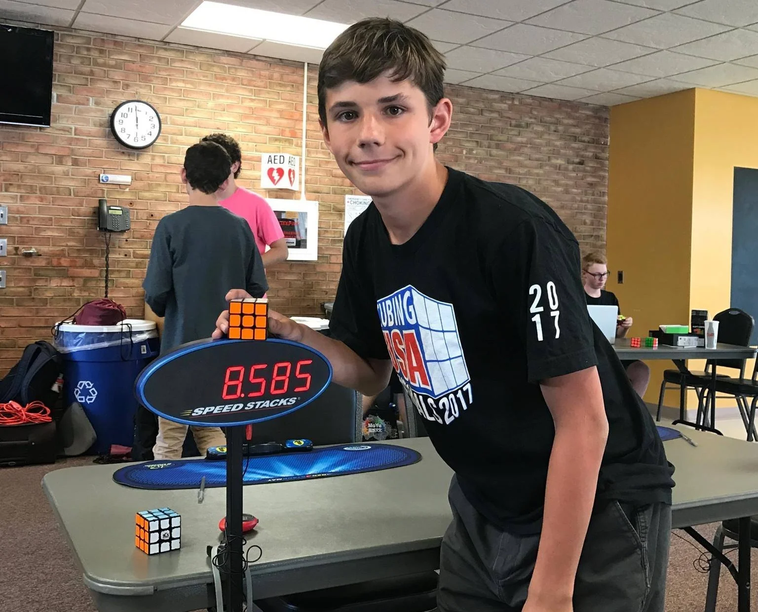 JULY 2016 Weird sport alert! You probably know the Rubik’s Cube and you probably know there are people that can solve the puzzle really fast, but did you know there is an actual sport called Speedcubing. Well, there is and our son Owen competes all over the country solving any number of multi-sided, multi-shaped puzzles. And having a cubing kid automatically makes you a cubing parent, which is why when Brian isn’t shooting pictures, you can find him in some convention hall or school gymnasium watching Owen compete. Just don’t ask him to wear one of the Cubing Dad t-shirts.