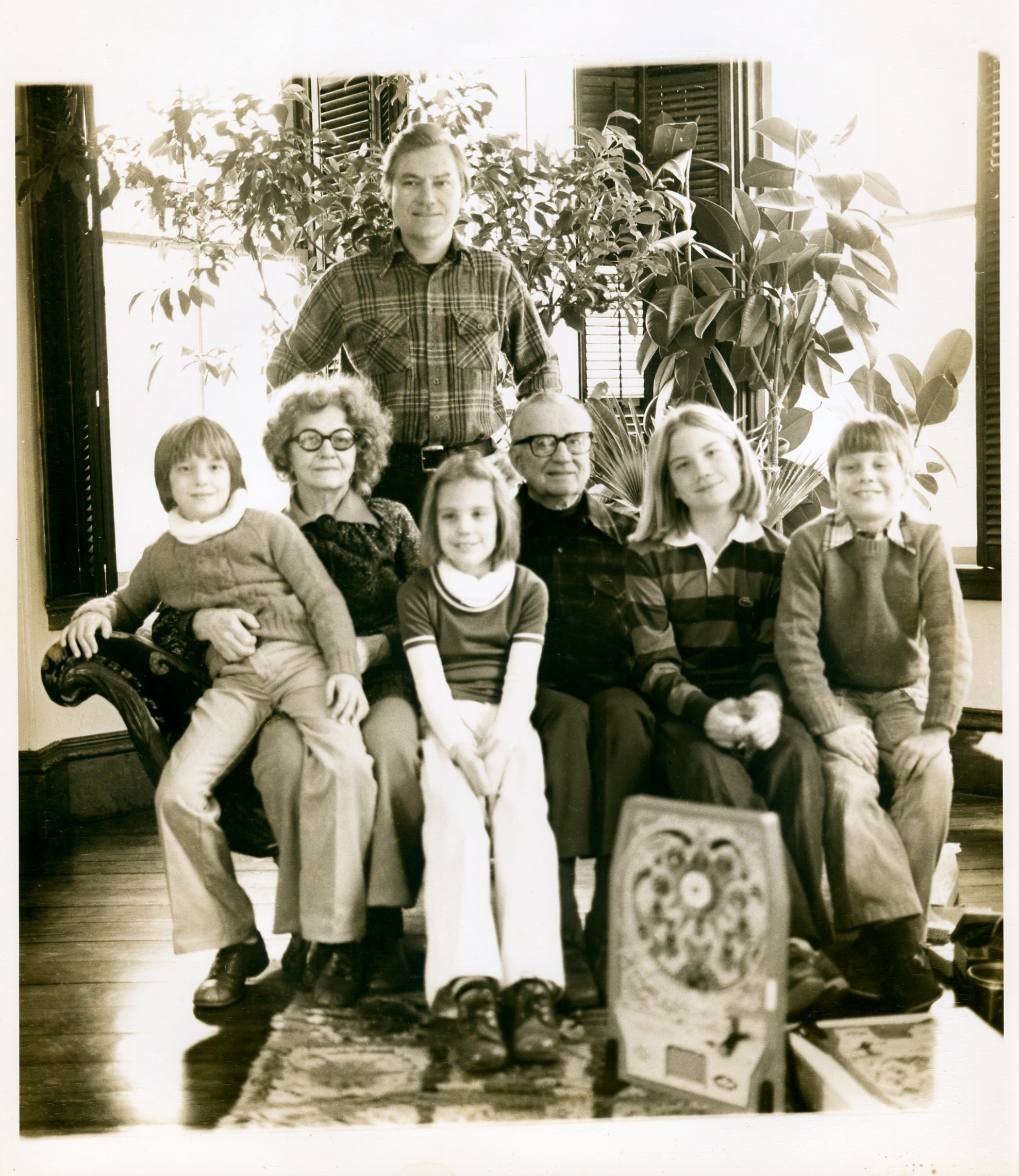   JU with his mother and father and children (left to right) - twins Chryssa and Shana, Jessica, and Aaron in the living room 900 Hope St., Bristol, RI,&nbsp;c.&nbsp;1975-76  