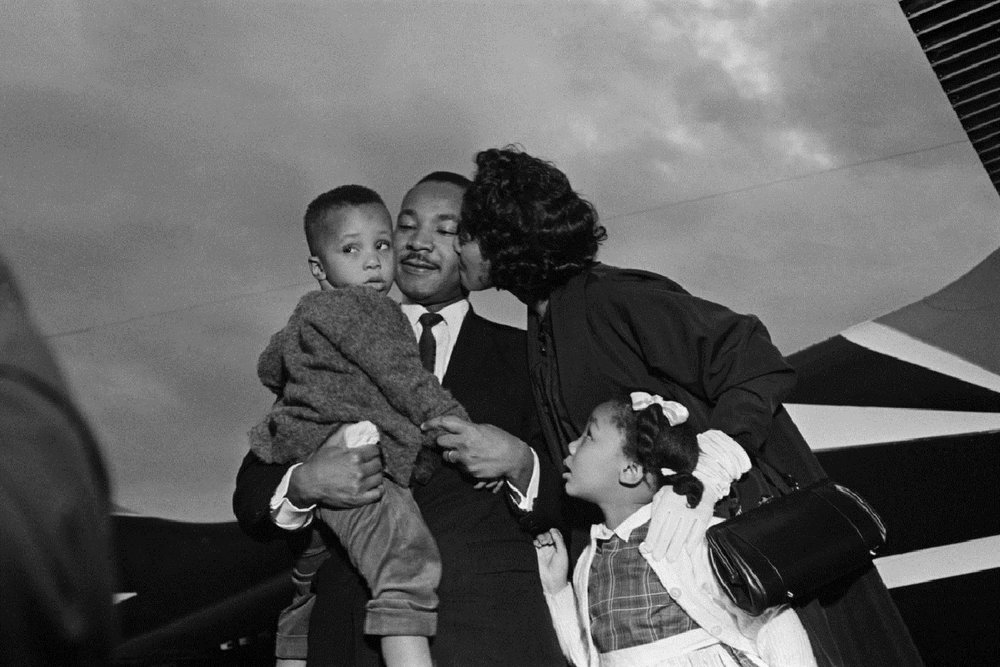  Dr. Martin Luther King, Jr. with his wife Coretta and two childre after he is freed from jail at the airport in Chamblee, Georgia. October 27, 1960. 