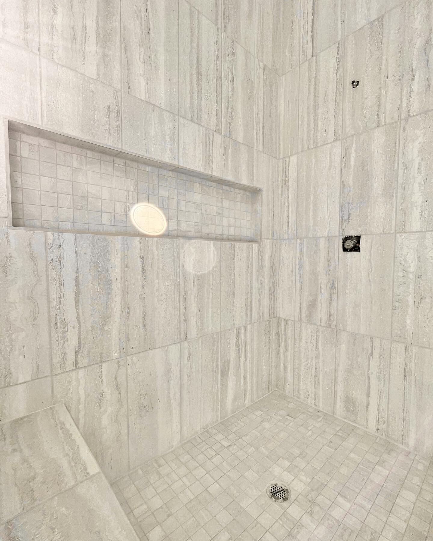 Talk about dreamy! We love natural light in a bathroom! Check out this beautiful tile install. 
.
.
.
.
.
#jimmathewsbuilder #cmathewsdesigns #thewaterspikeroad #newhome #interiordesign #primarybathroom