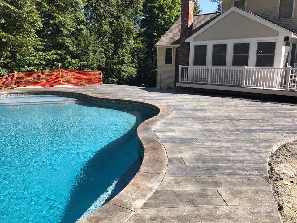 New Textured Concrete Pool Deck 