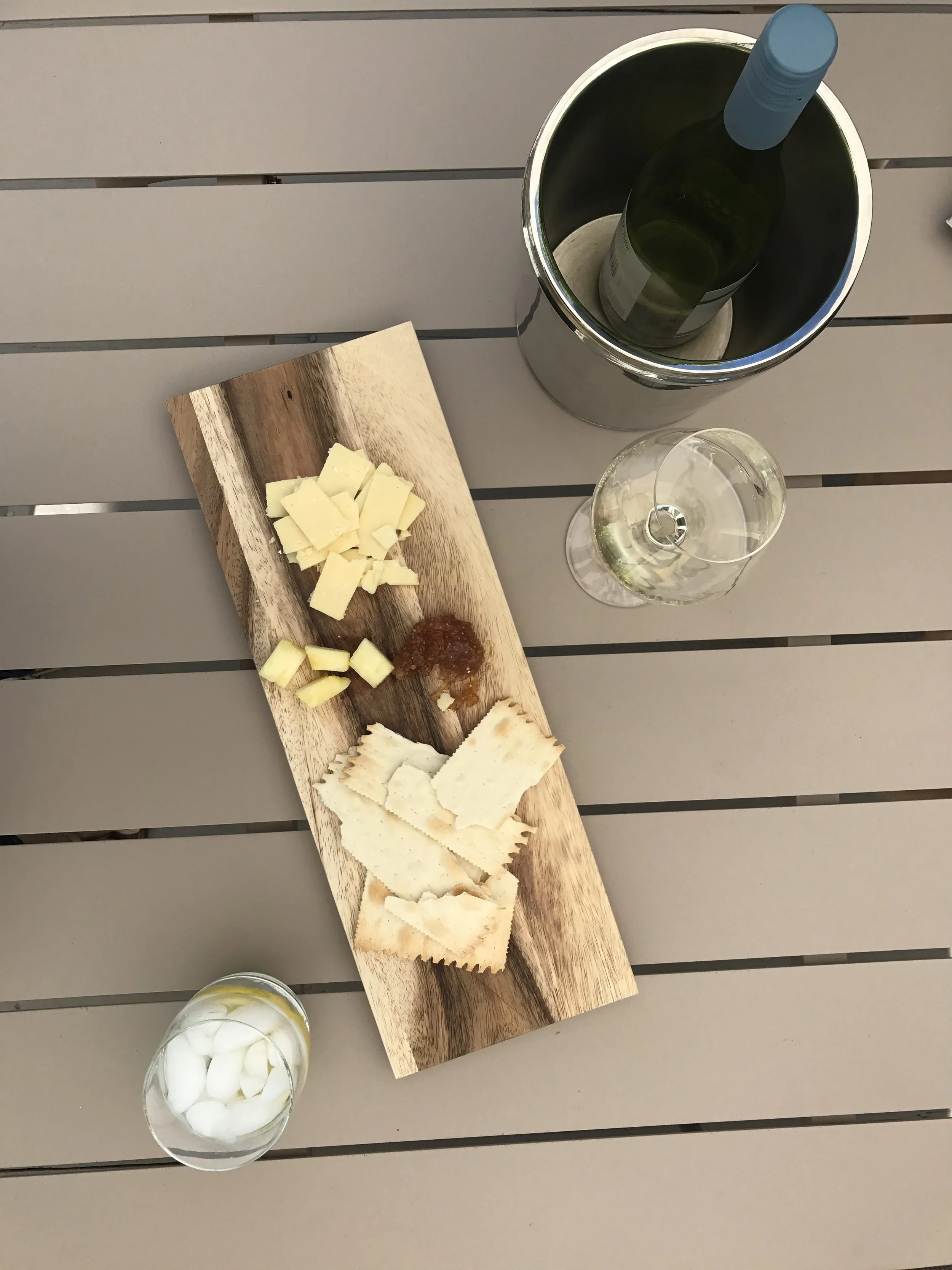 Sunday afternoon cheese platter =) With white wine for my Beautiful Husband and a lemon water for me!