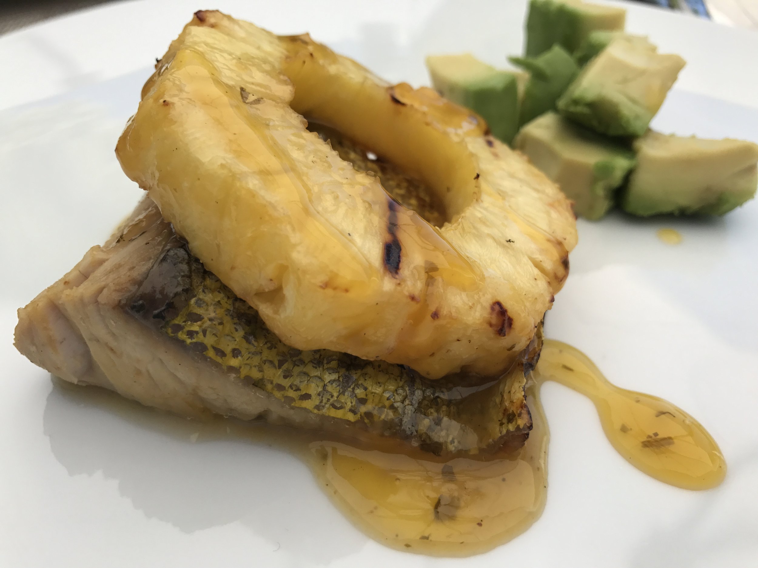 Glorious dinner prepared by my Husband on Sunday night! Grilled mahi-mahi with grilled pineapple, all drizzled with a decadent mango sauce. Loved it! It reminded us of our honeymoon in Bora Bora =)
