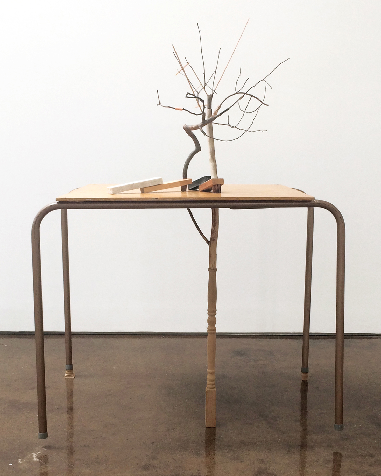   leter arber  &nbsp;2017 twigs, mixed media wood products, marble, granite, table 52 x 37 x 30 inches 