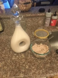 Fresh almond milk (stored in a wine decanter LOL) and the leftover pulp