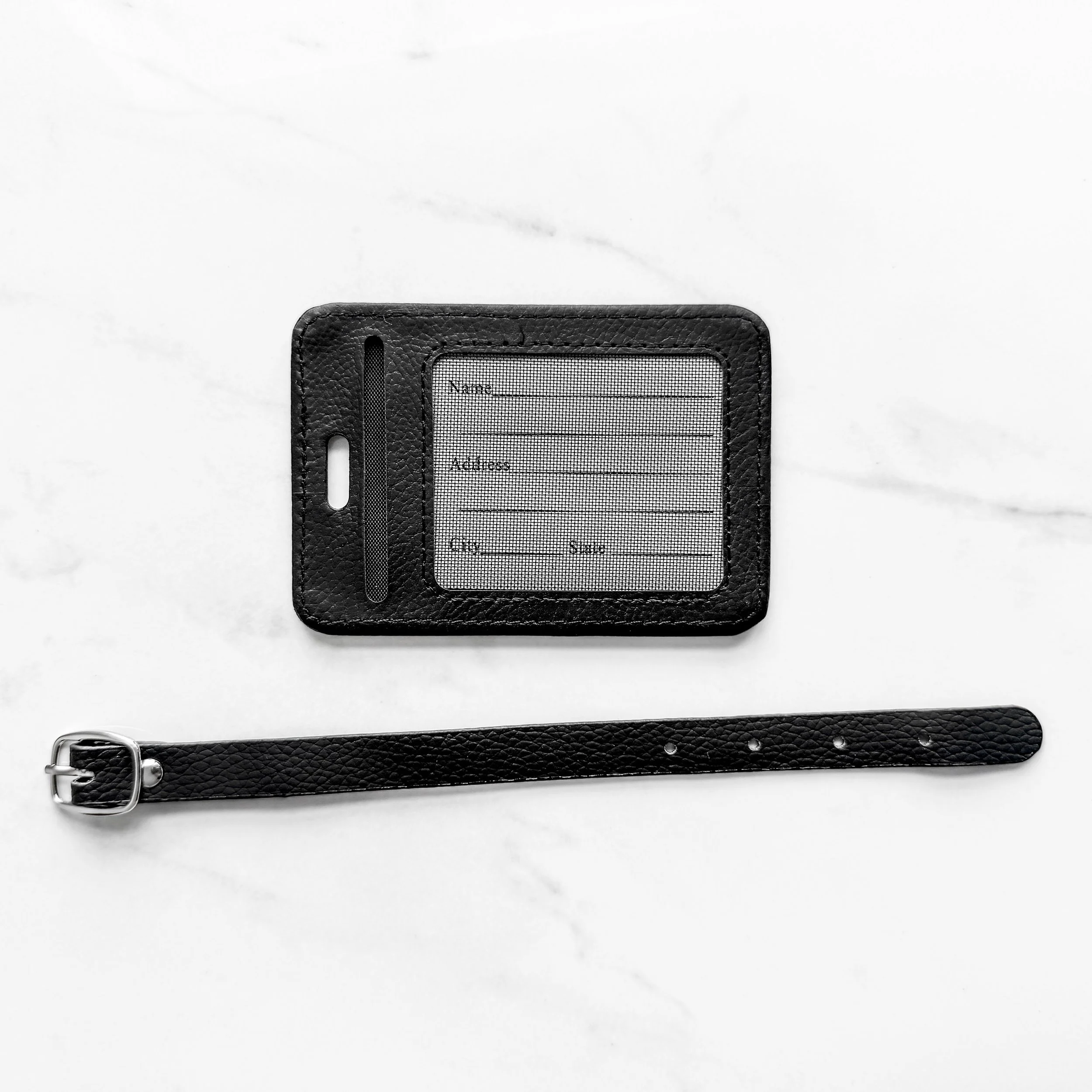 Back of Luggage Tag and Strap.jpg