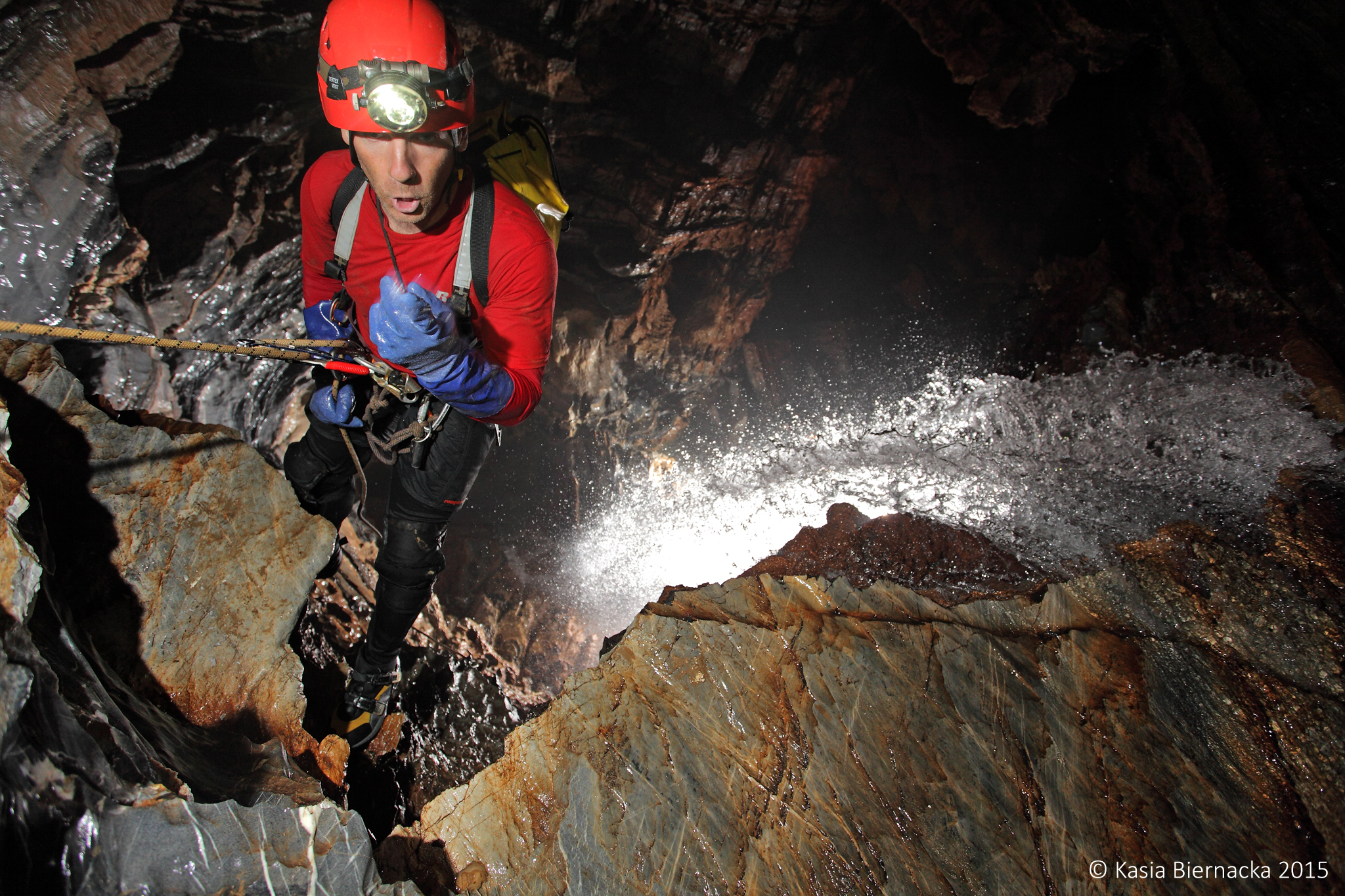 Derek Bristol climbing into Redball Canyon. Photo by Kasia Biernacka.
