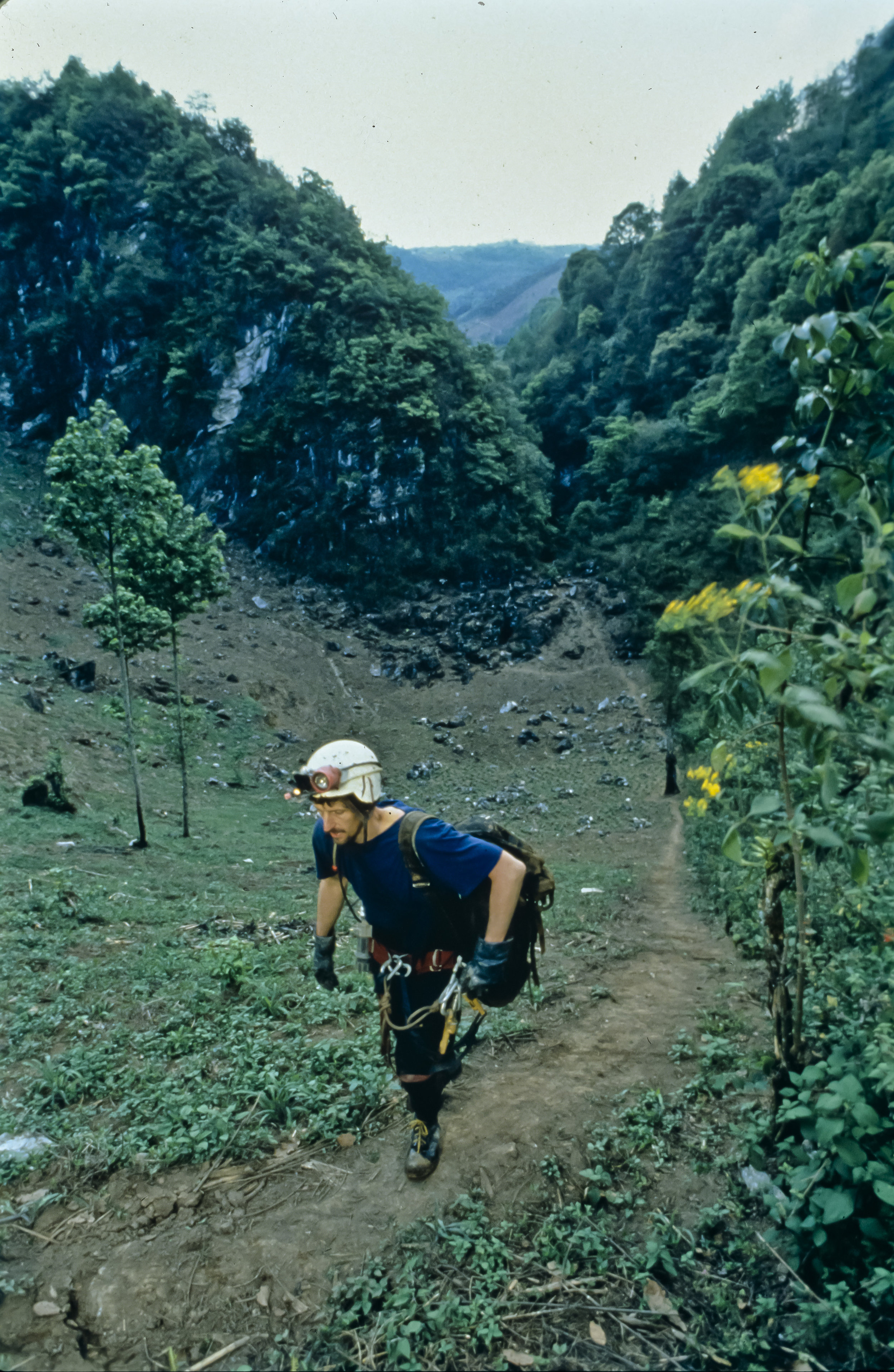  Bill Stone makes his way up the caver trail from the entrance of the Sotano de San Agustin to basecamp. Photo by U. S. Deep Caving Team/Wes Skiles. 