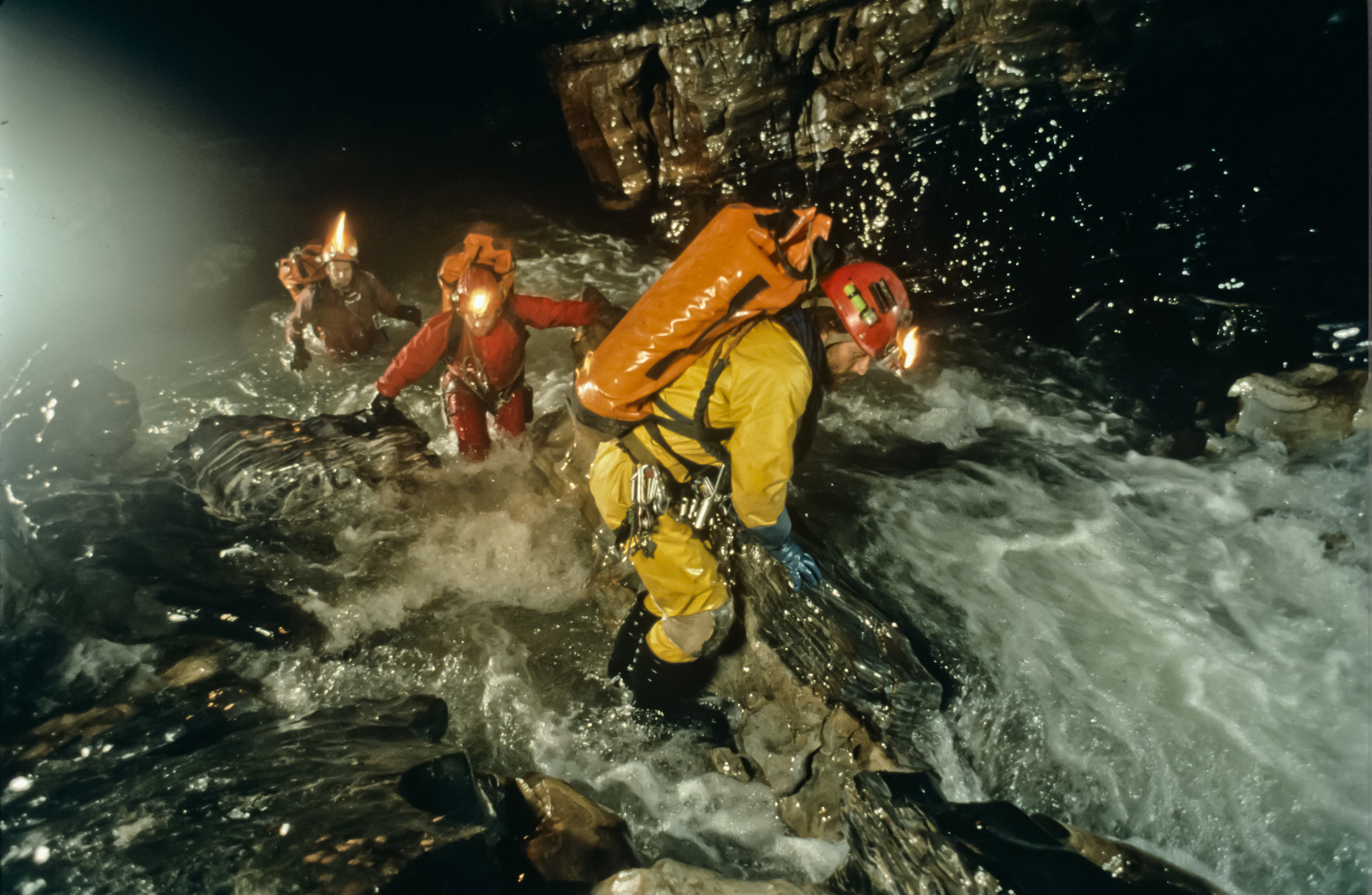  Lead photo for the National Geographic story, September 1995 issue. The caption read "Caught in a raging runoff that fell as rain 2,500 feet [760m] above them, explorers struggle for balance within the Huautla cave system. Photo by U. S. Deep Caving