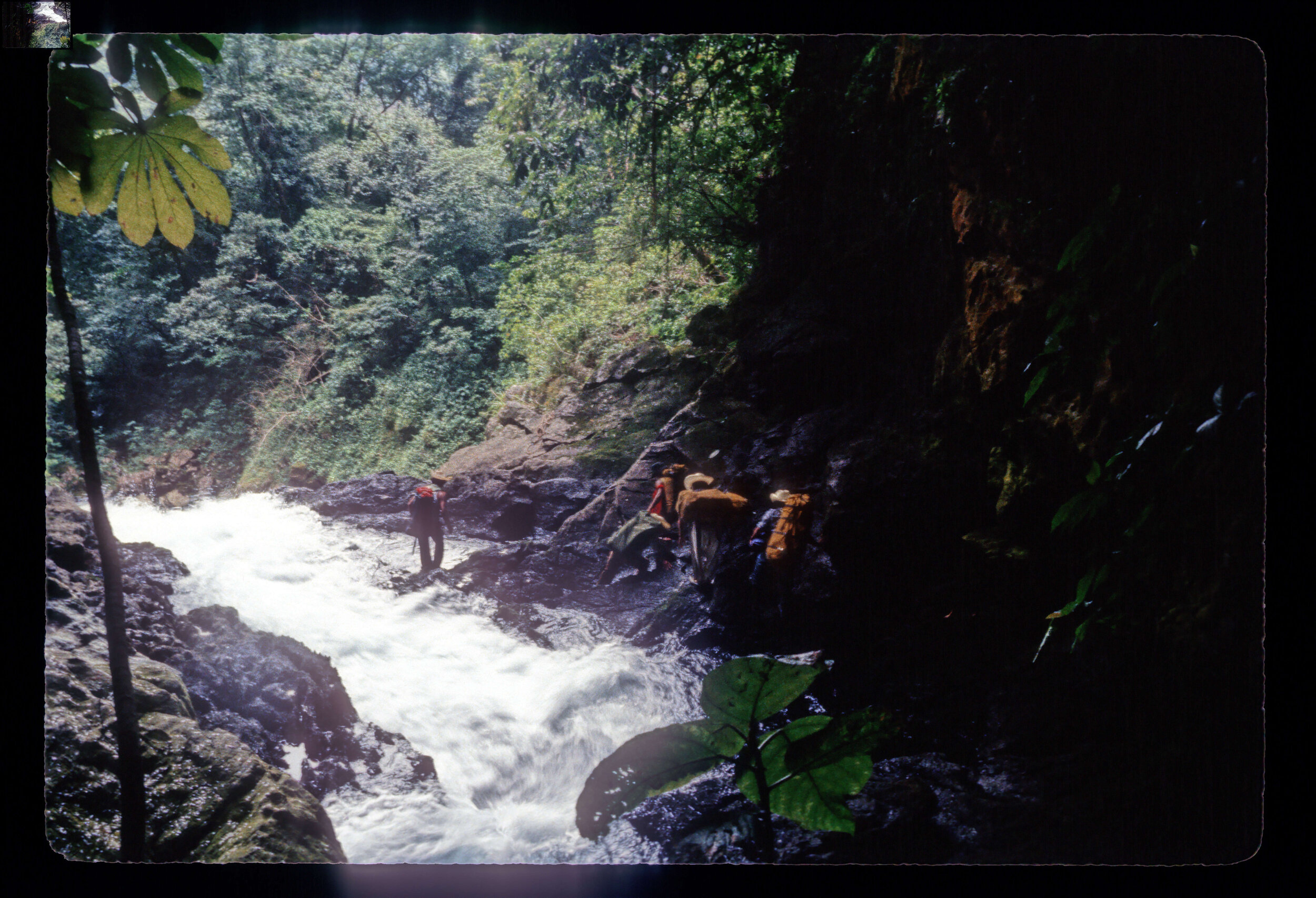  Gear hauling into the cave. Photo by Bill Stone. 