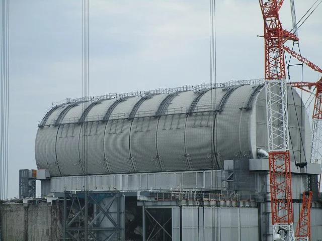 This is the reactor in which filming took place. The cylindrical structure is a new roof to house cranes to undertake the used fuel removal.