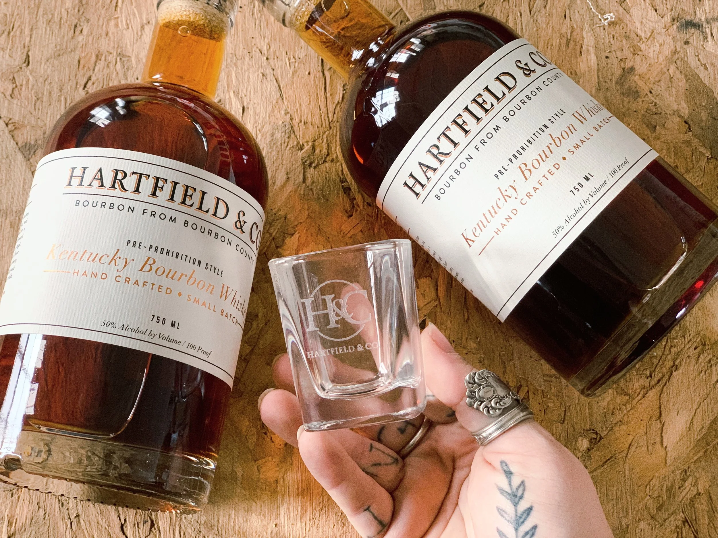 Hartfield & Co Distillery Shot Glass with Bottles - copyright Hartfield & Co. Distillery 2023 - www.hartfieldandcompany.com