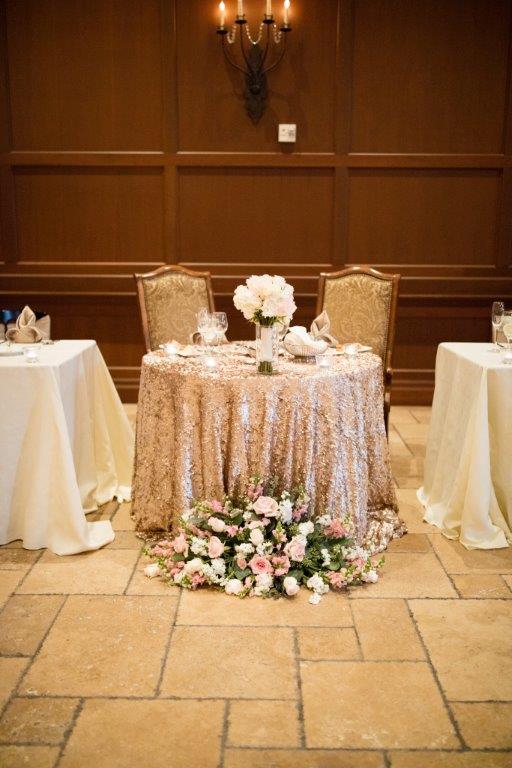 Pinterest inspiration: Glam vintage sweetheart table with a sequin gold table linen