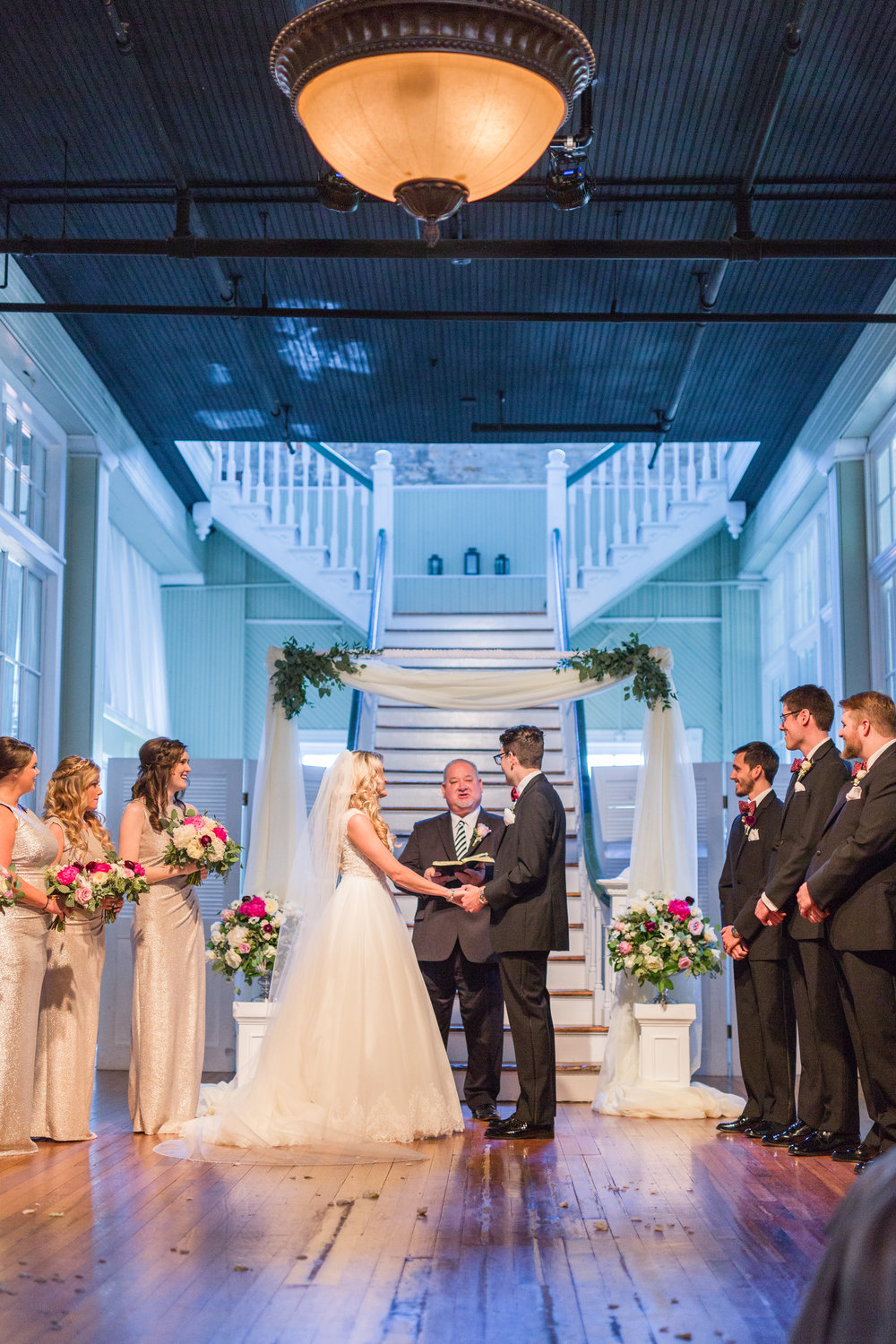 We incorporated the draping arch while insuring the florals matched the rest of the ceremony