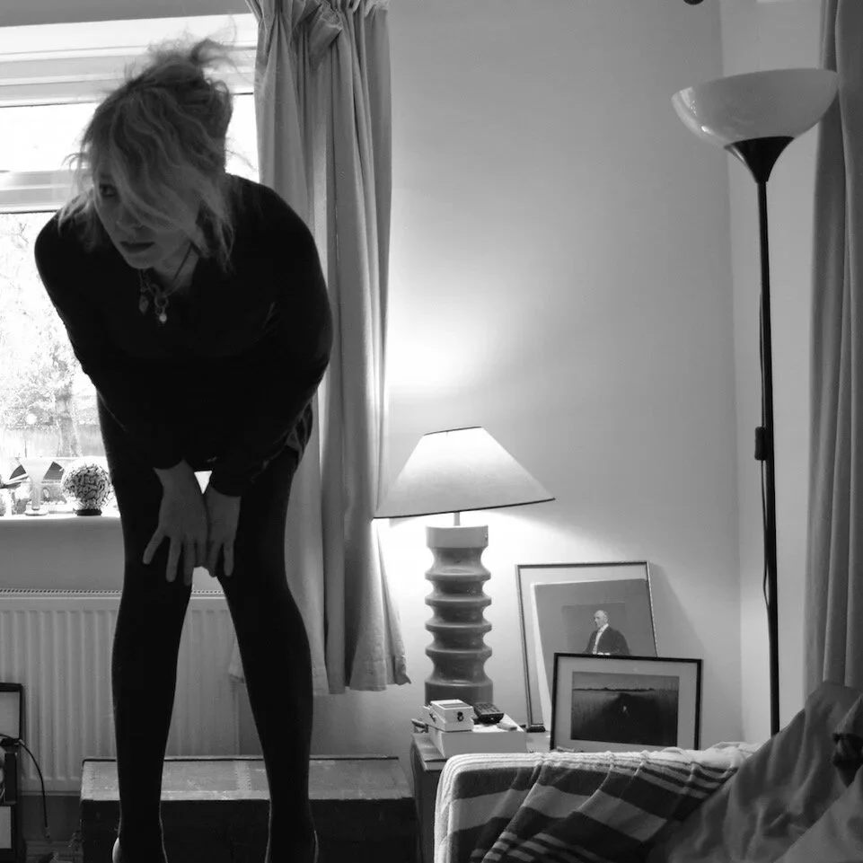 Lettie avant-pop artist playing piano art pop music in the style of Kate Bush, Regina Spektor, and St. Vincent.