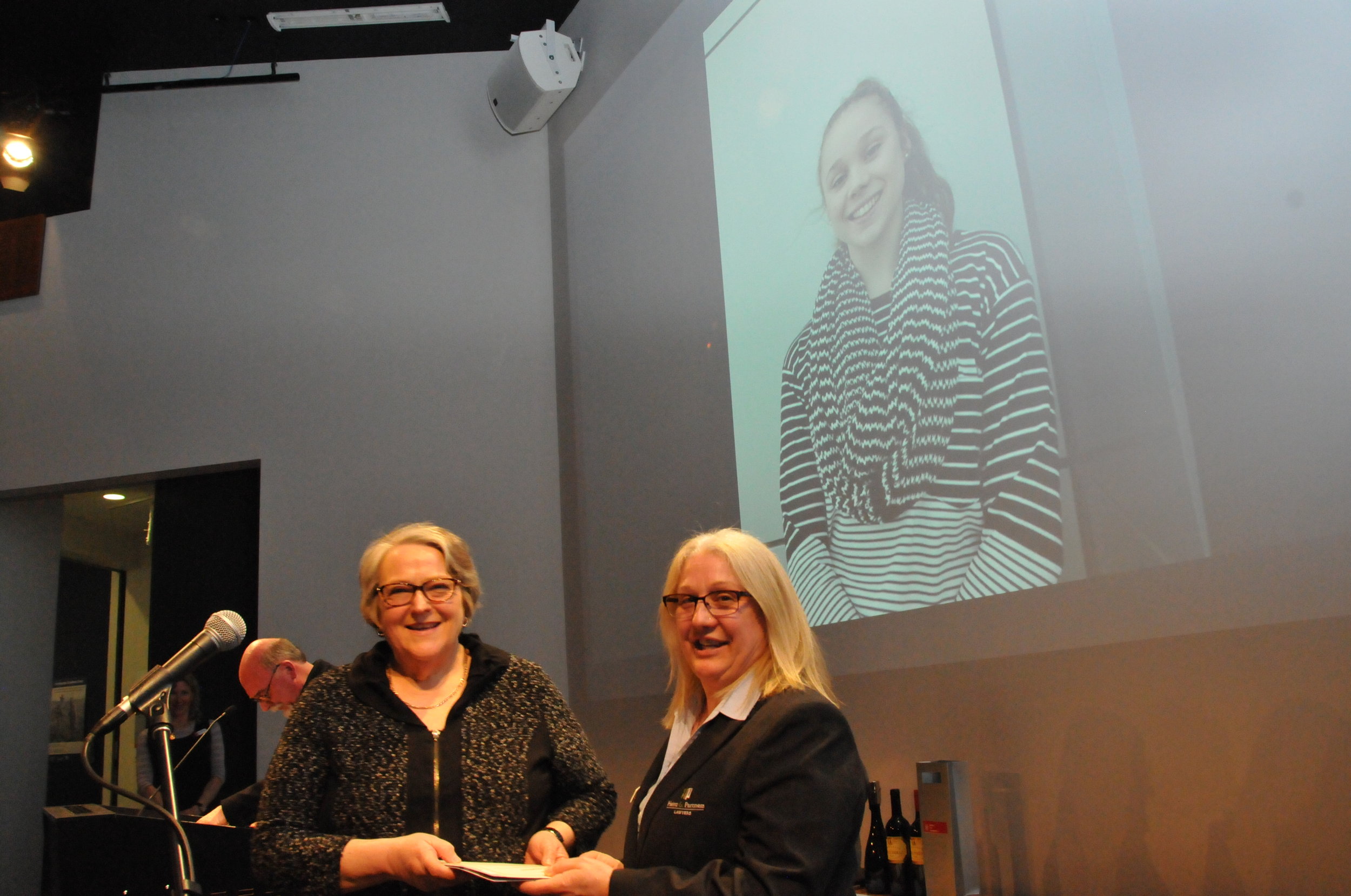 Mrs Perkins representing Sarah Perkins with Wendy Rechenberg bestowing the AH Yung Award