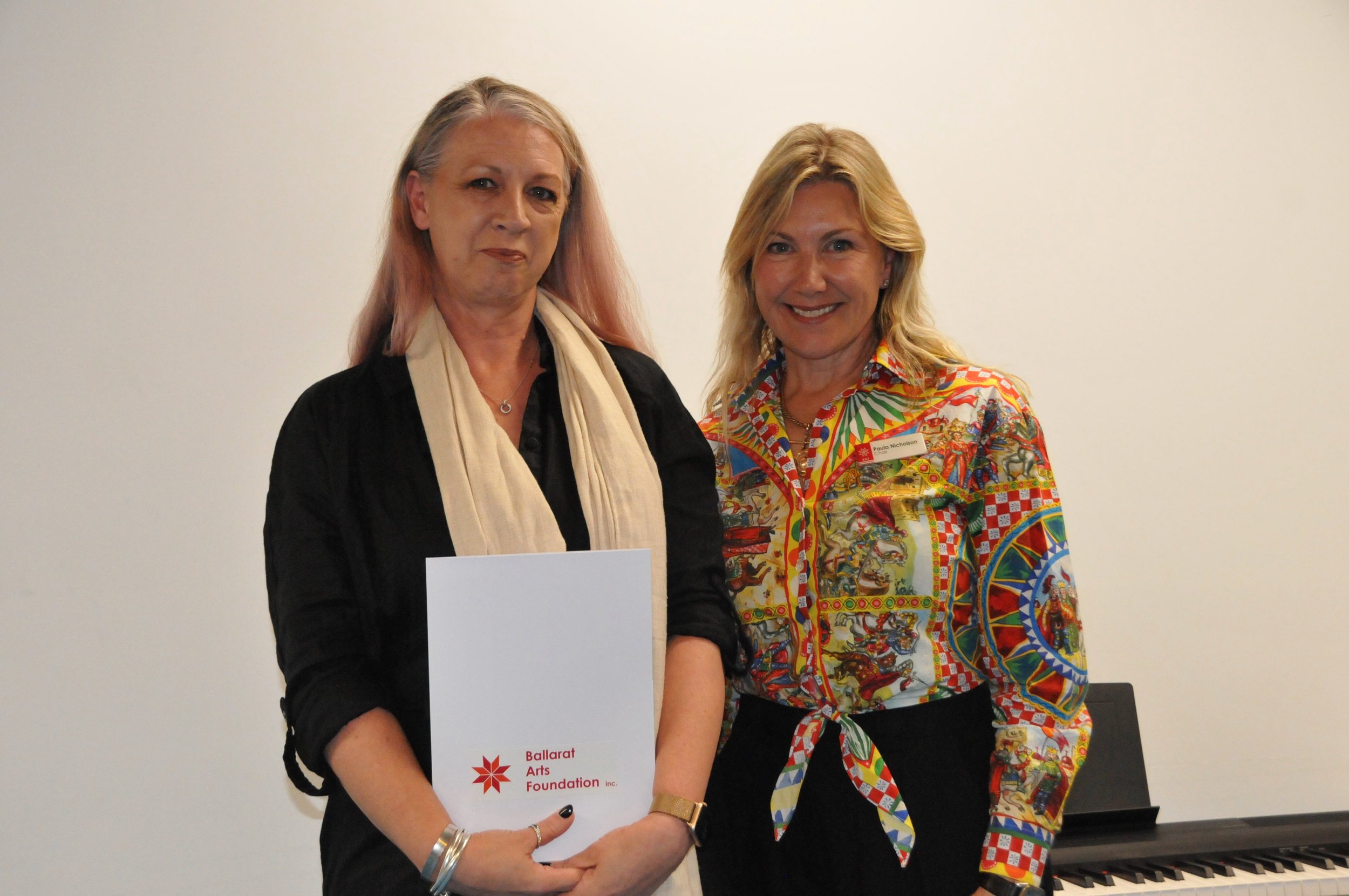 Kelly Chivers receiving the Isobella Foundation Award on behalf of her daughter Charlotte Chivers, with Paula Nicholson representing the donor.jpeg