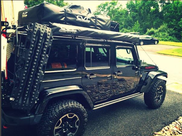 Profile image. Nitto Trail Grapplers, 33" and Max Trax mount. (Note: old CVT tent pictured.)