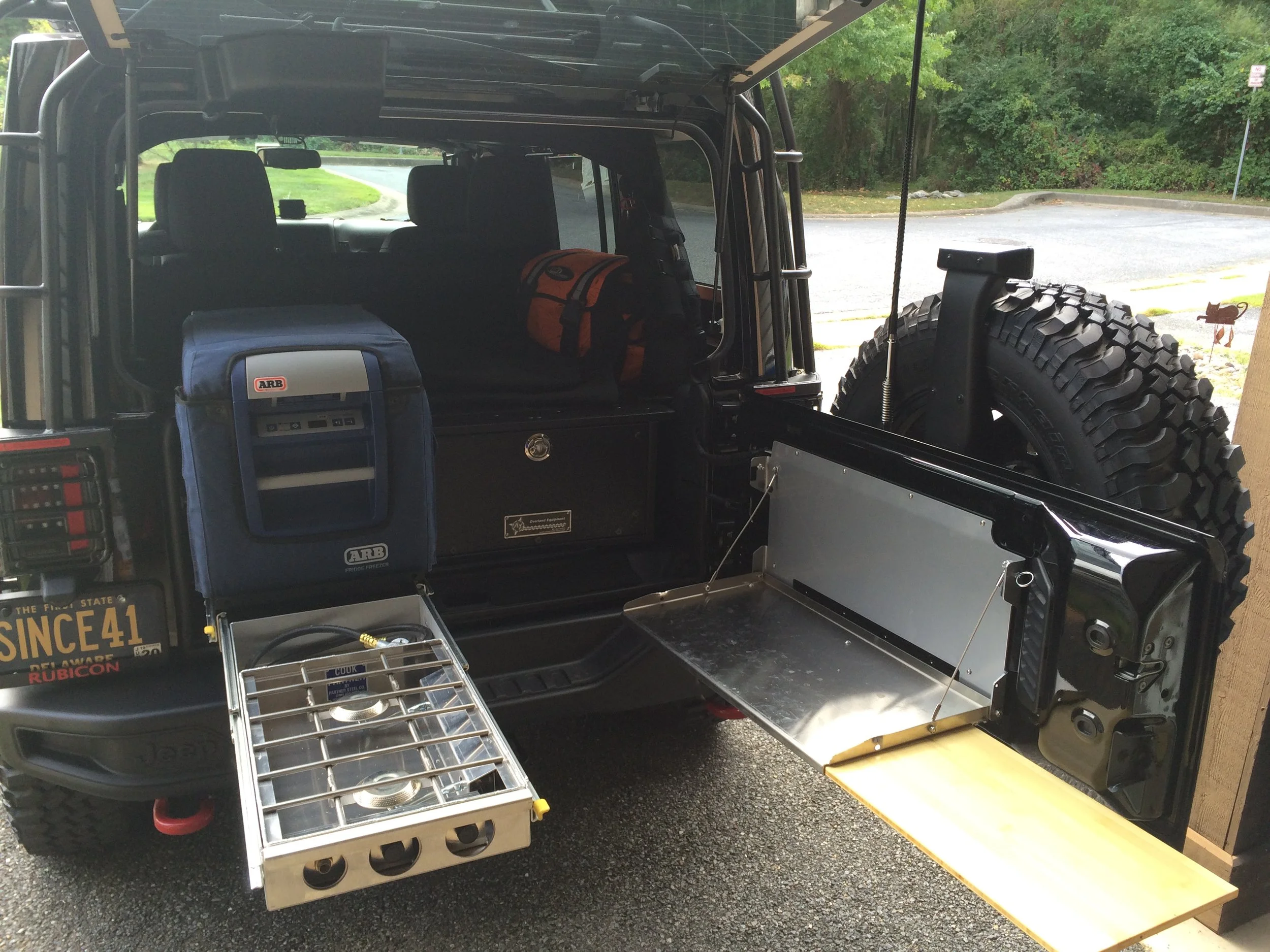 Full rear storage area with AT Overland box.