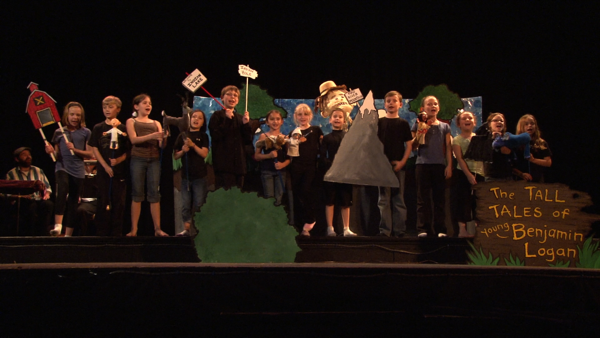 Residencies often culminate in school-wide sharings. This program, for example, was a collaboration with an elementary school art teacher. Students created a story and songs that accompanied an interactive puppet show. 