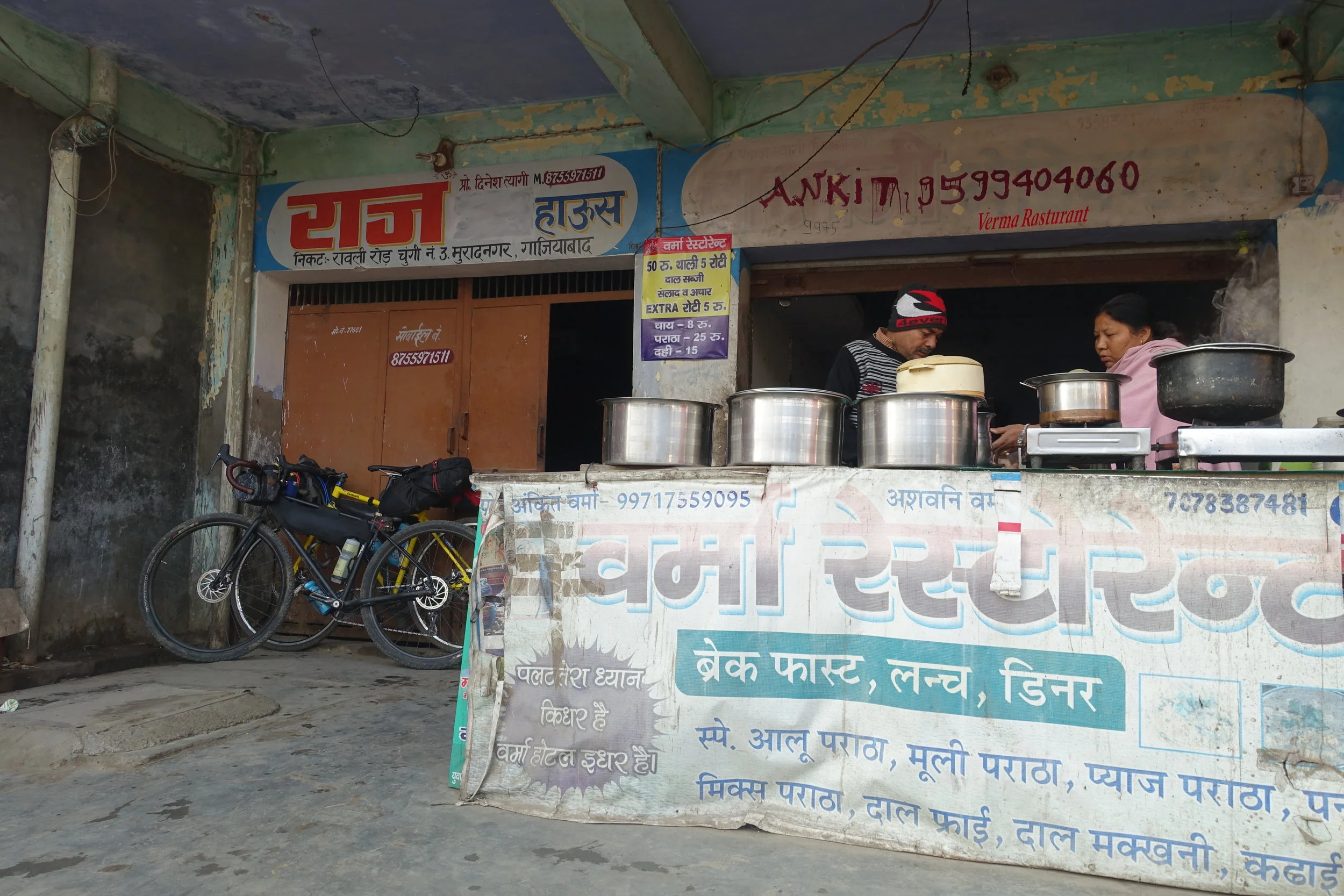 8am breakfast spot. This is a typical rural style food outlet where there isn't a menu and you just get given whatever they make, fresh and to order, right in front you to behold. This time we had stuffed parantha (typical Indian flatbread) with paneer (cottage cheese), onions and chillies. And of course chai. We went through endless chai. 