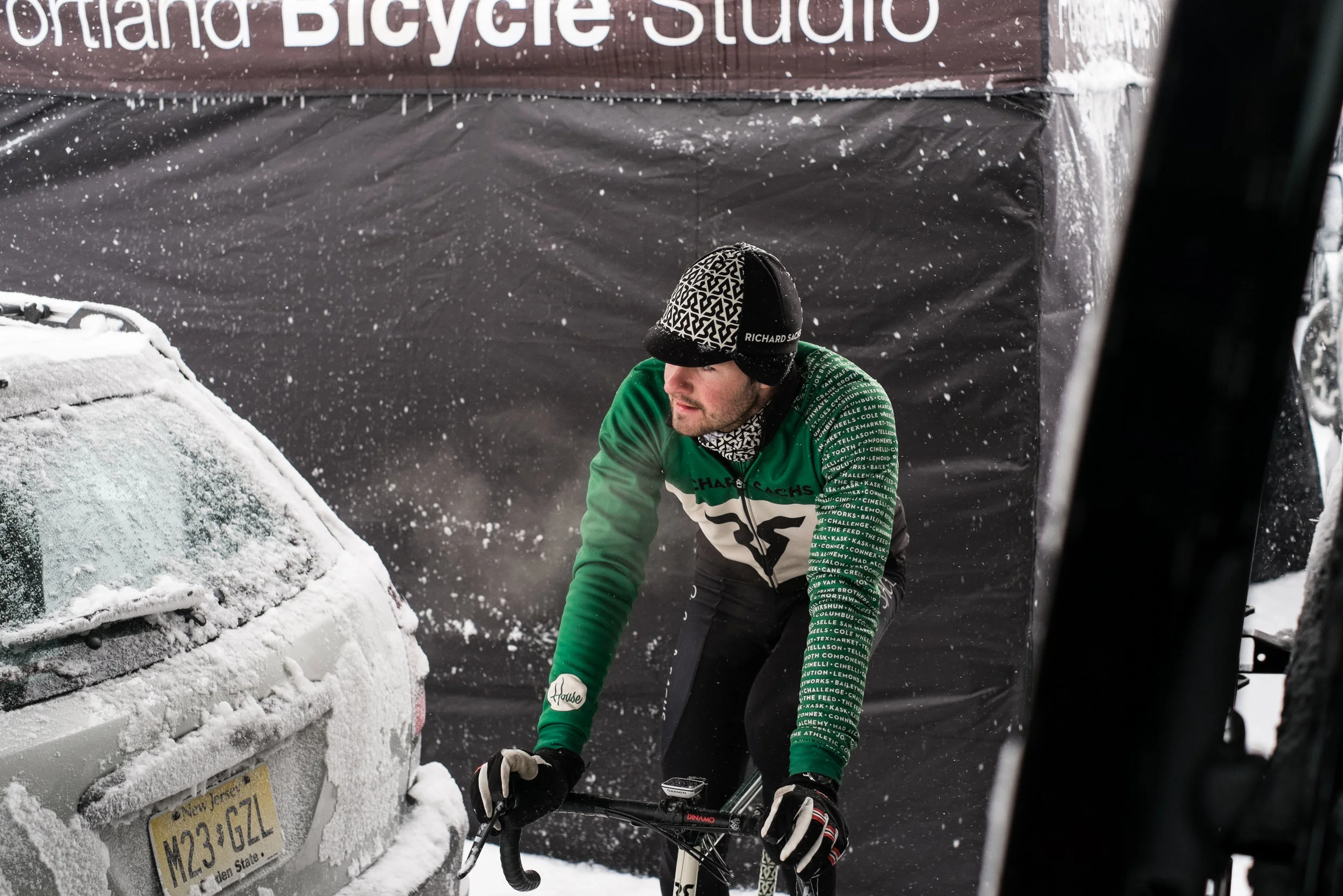 SAM O’KEEFE spinning the legs out before a snowy pre-ride