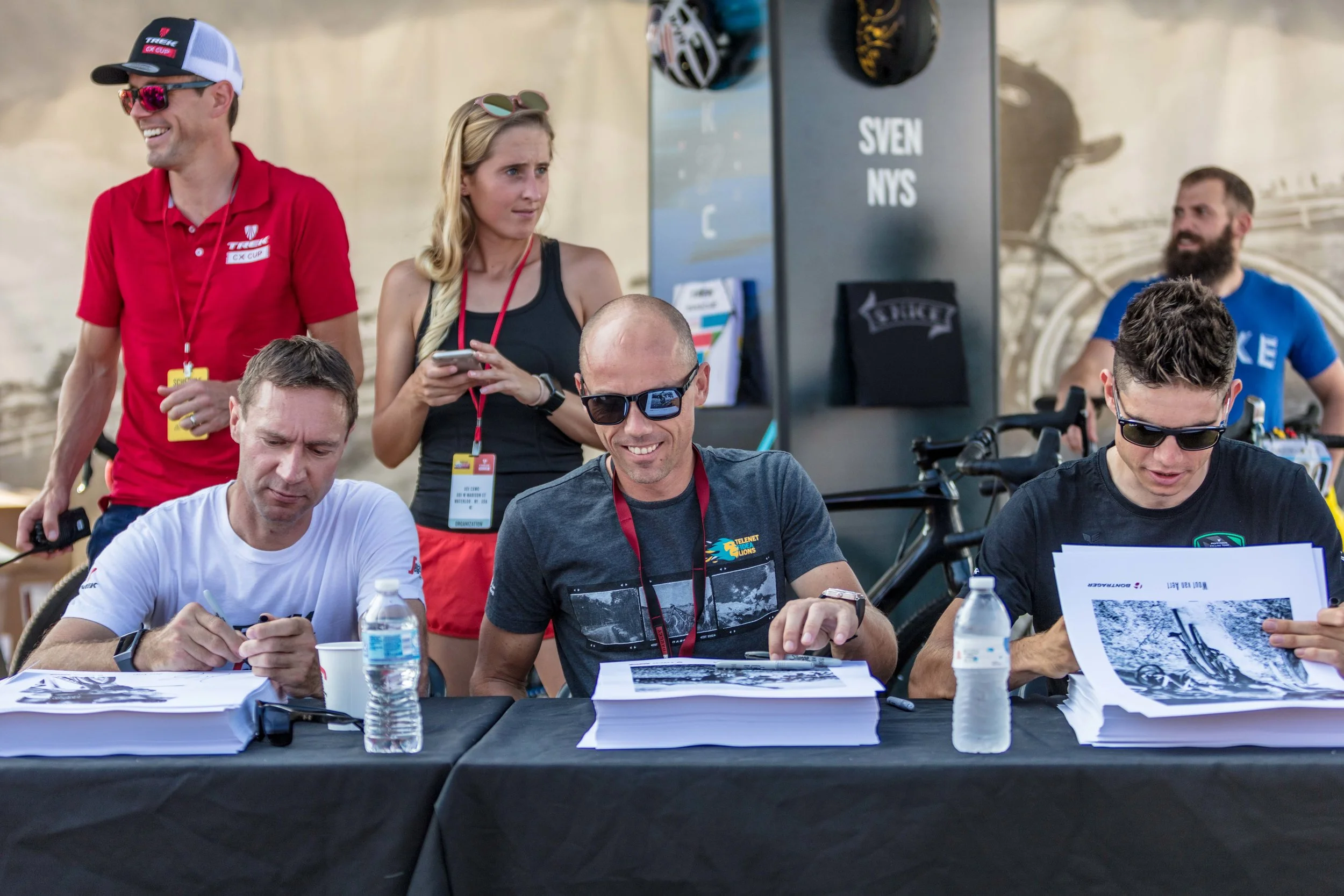 Starstruck: Cycling legends are everywhere here. Just walking around and easily approachable. Here; Jens, Sven and Wout are signing posters promoting their sponsors.