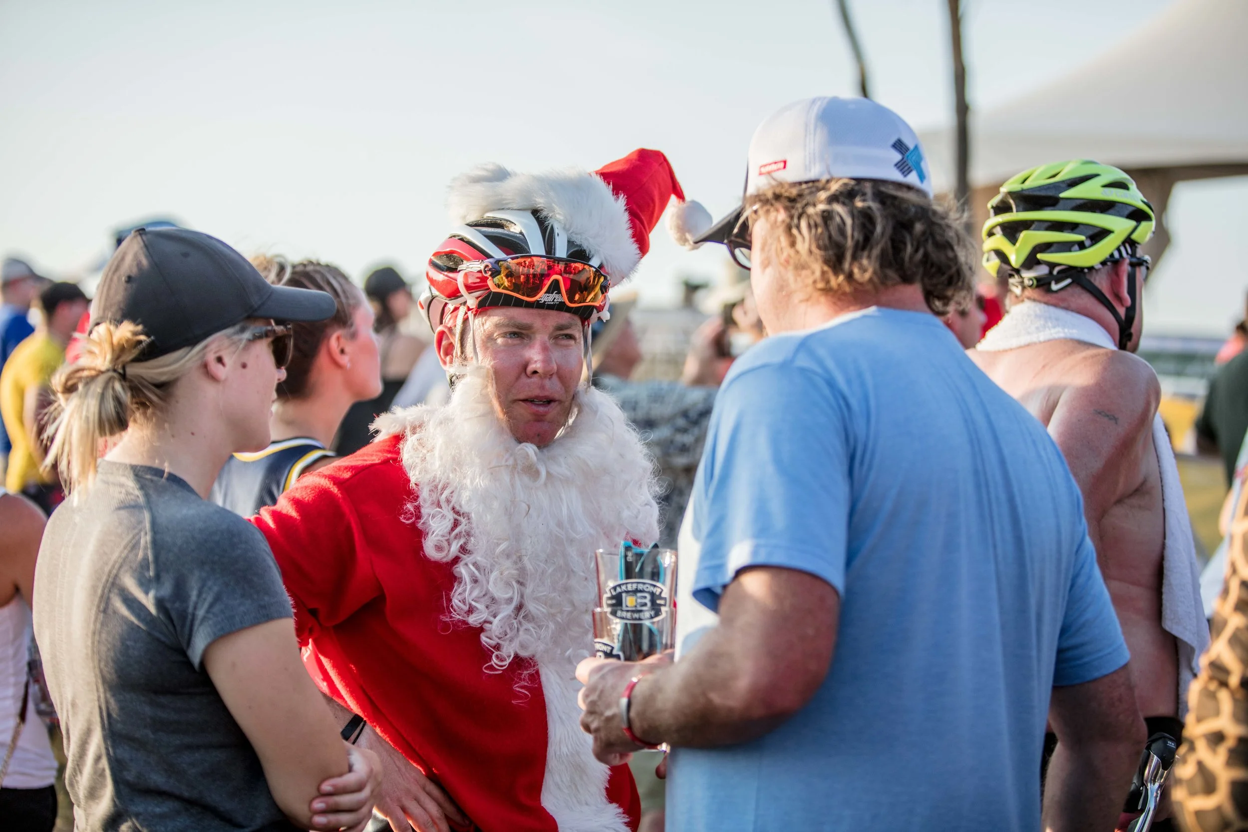 Racing in a Santa Claus costume during a 90 degree heat wave takes another level of fitness.